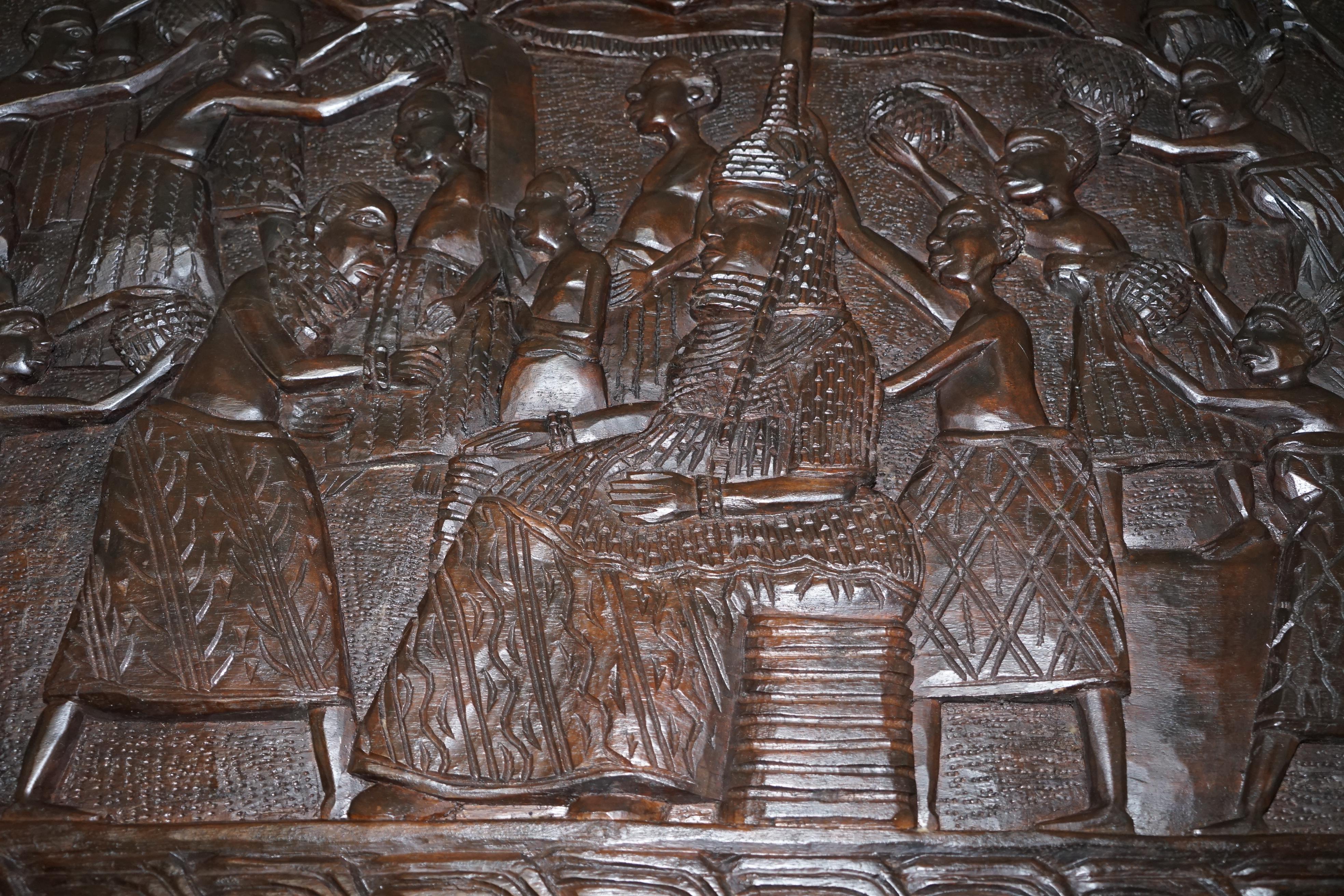 Hand-Carved African Dining Table with Decorative Benin Figures Matching Chairs 3