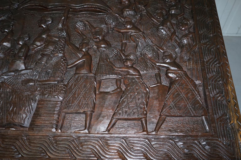 HandCarved African Dining Table with Decorative Benin Figures Matching