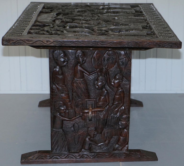 HandCarved African Dining Table with Decorative Benin Figures Matching