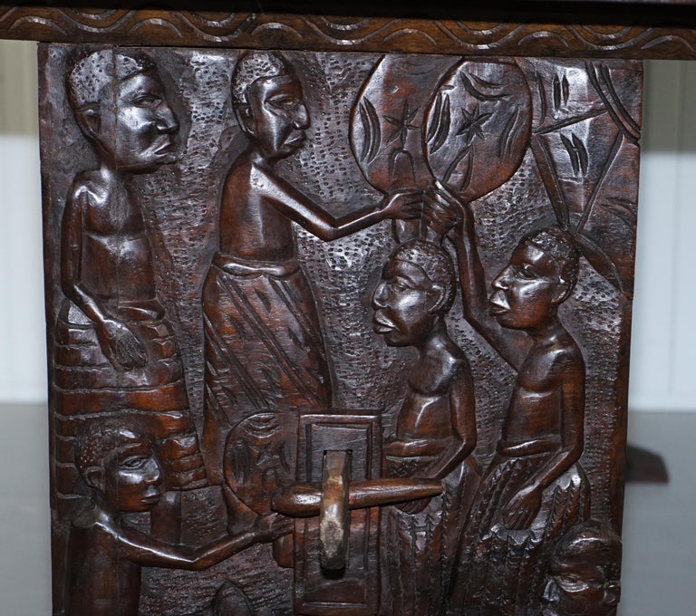 HandCarved African Dining Table with Decorative Benin Figures Matching