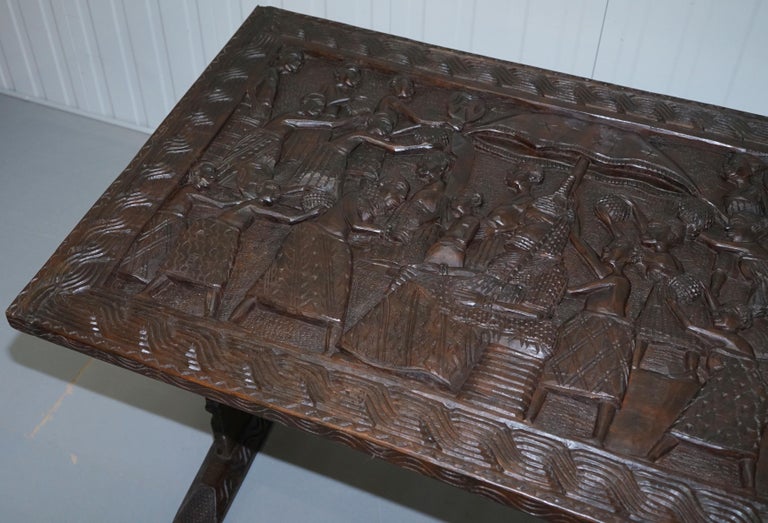 HandCarved African Dining Table with Decorative Benin Figures Matching