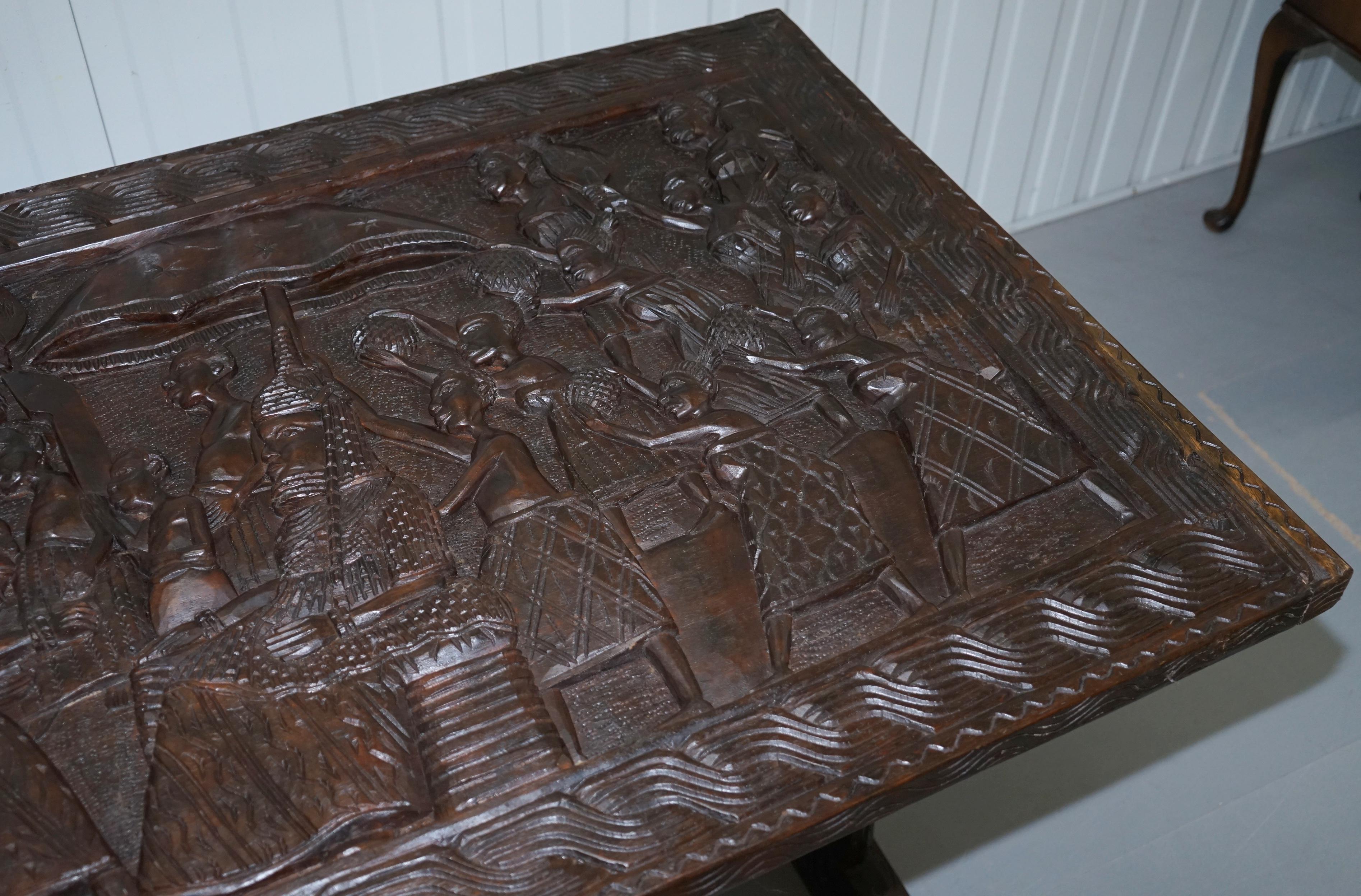 Mid-Century Modern Hand-Carved African Dining Table with Decorative Benin Figures Matching Chairs