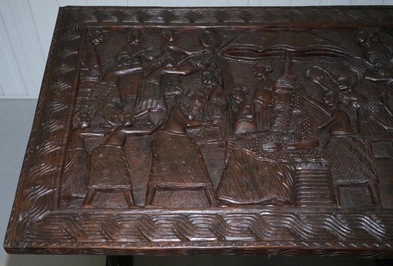 HandCarved African Dining Table with Decorative Benin Figures Matching