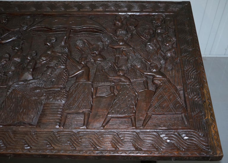 HandCarved African Dining Table with Decorative Benin Figures Matching