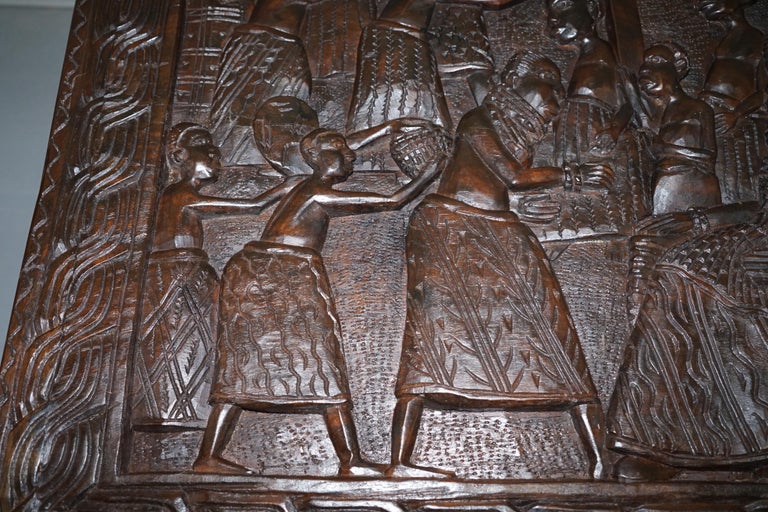 HandCarved African Dining Table with Decorative Benin Figures Matching