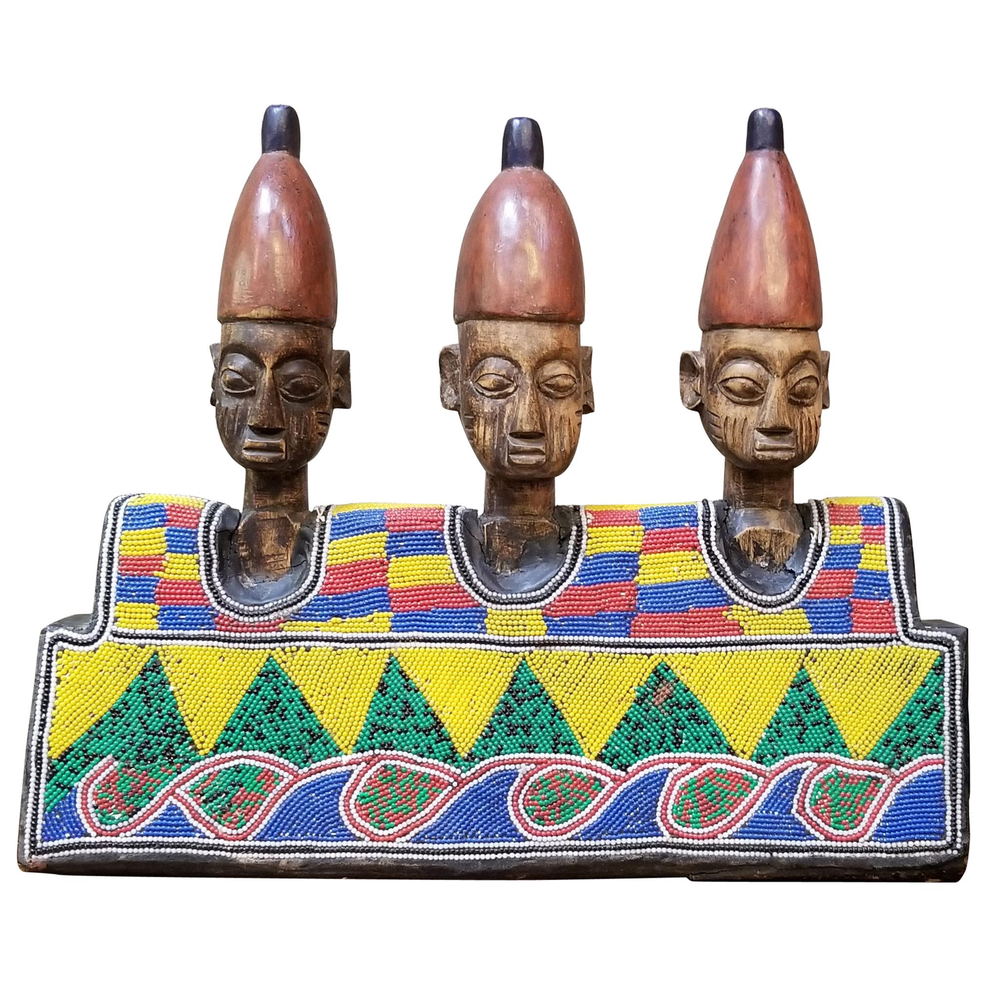 Hand Carved African Wood and Beaded Sculpture For Sale