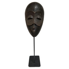 Hand Carved African Wooden Mask on Stand