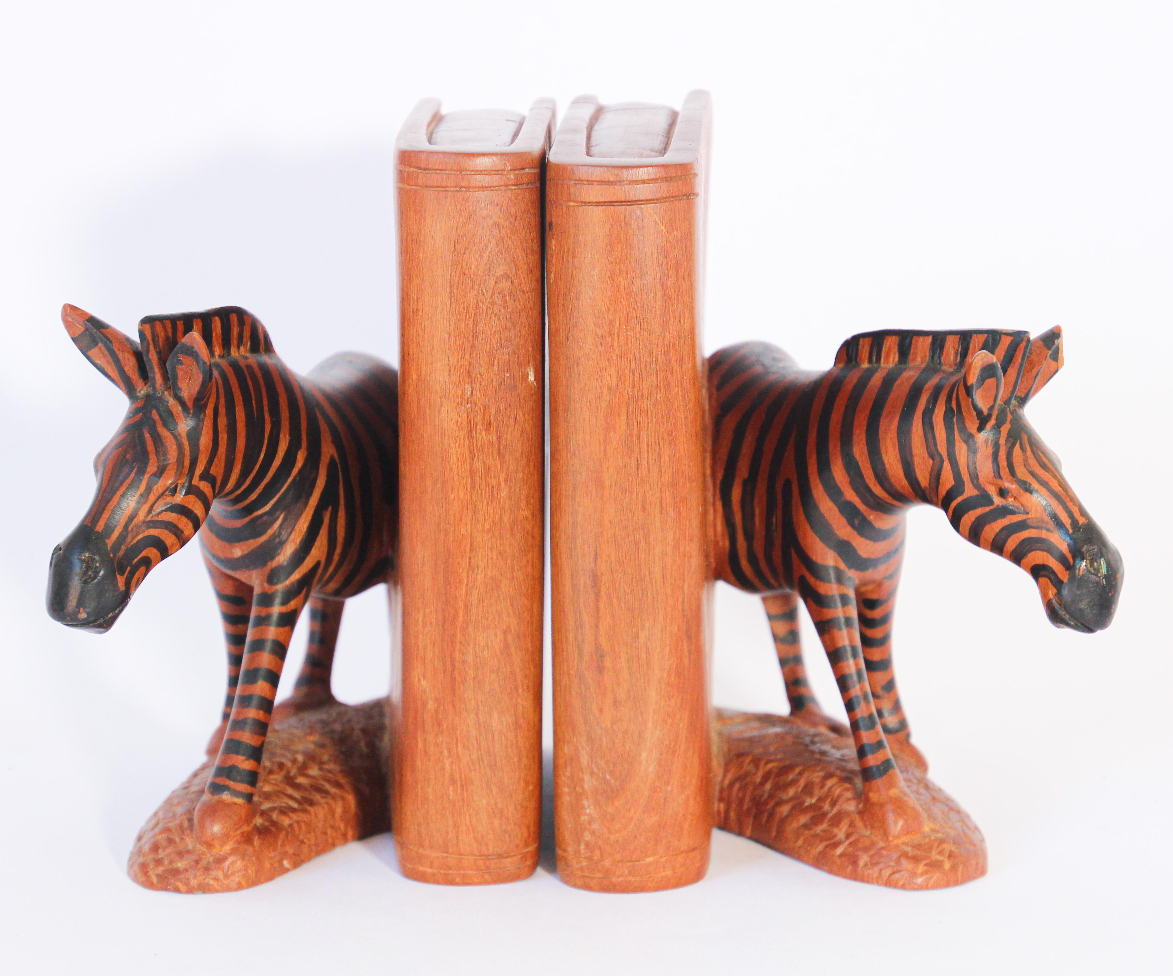 Nice pair of hand carved heavy wood bookends African Zebra sculptures.
This fine detailed hand carved and hand painted elephant bookends.
Each zebra sculpture with base and side is handcrafted from 1 piece of wood.
They are very well carved and