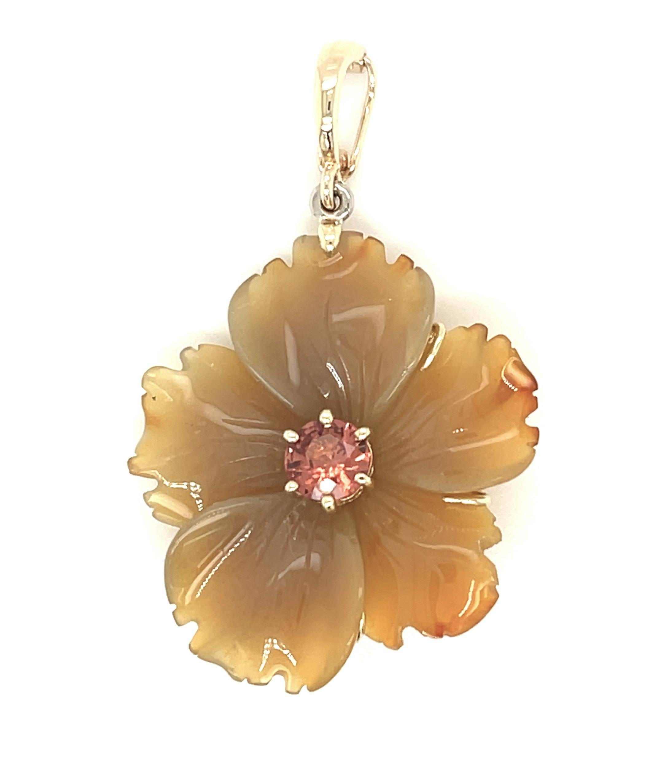 This finely hand carved agate flower necklace is a conversation piece and  wonderful way to add interest to your wardrobe. The agate flower has subtle color variations of tan and amber that make this beautifully three-dimensional flower look even
