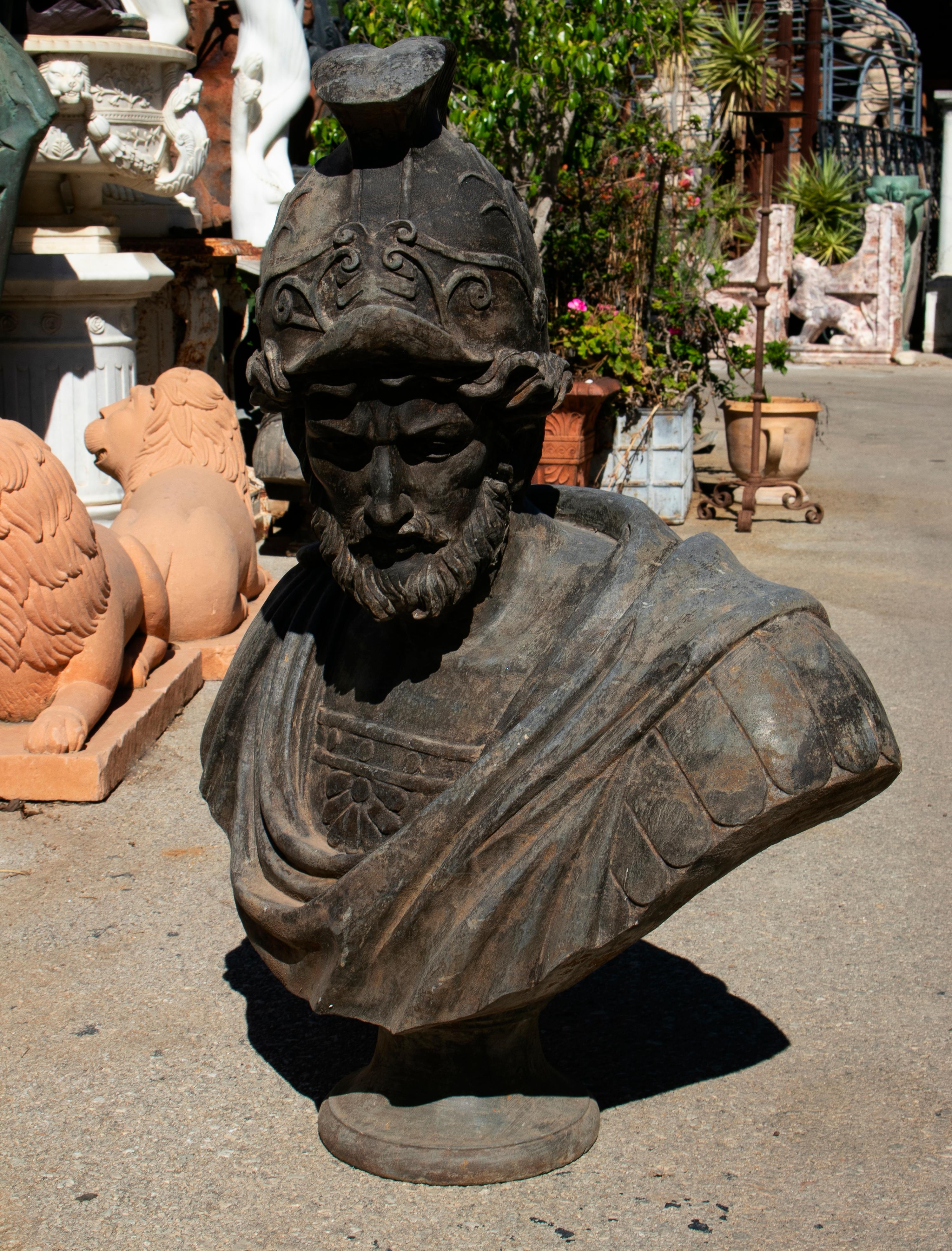 Hand carved marble bust of Roman general with helmet and Toga, that has been aged to look antique.
