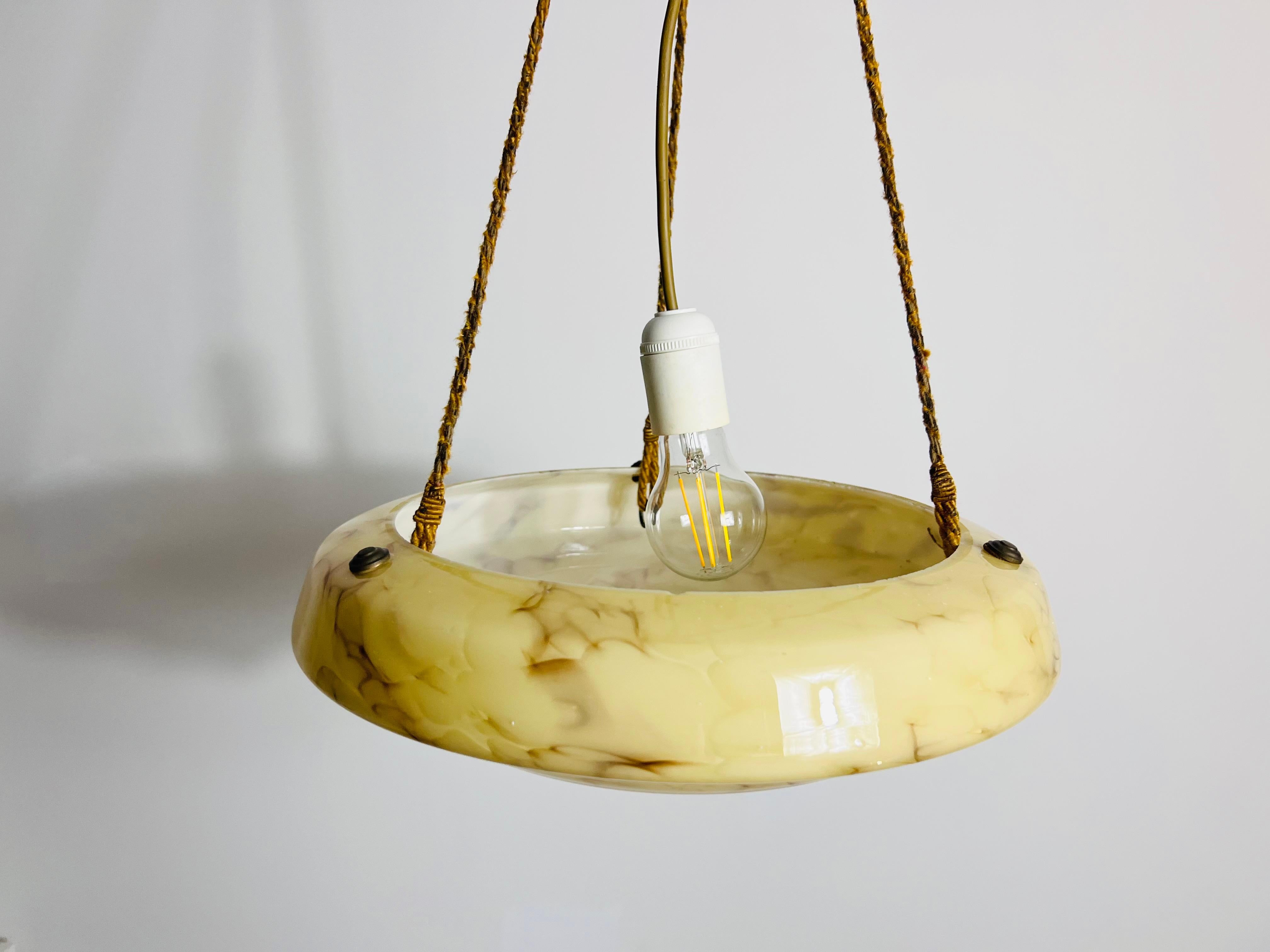 Lampada da soffitto in vetro e ottone intagliato a mano, anni '30, Germania in vendita 1