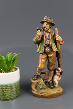 Hand Carved and Hand Painted Wooden Sculpture of a Hunter with Dog