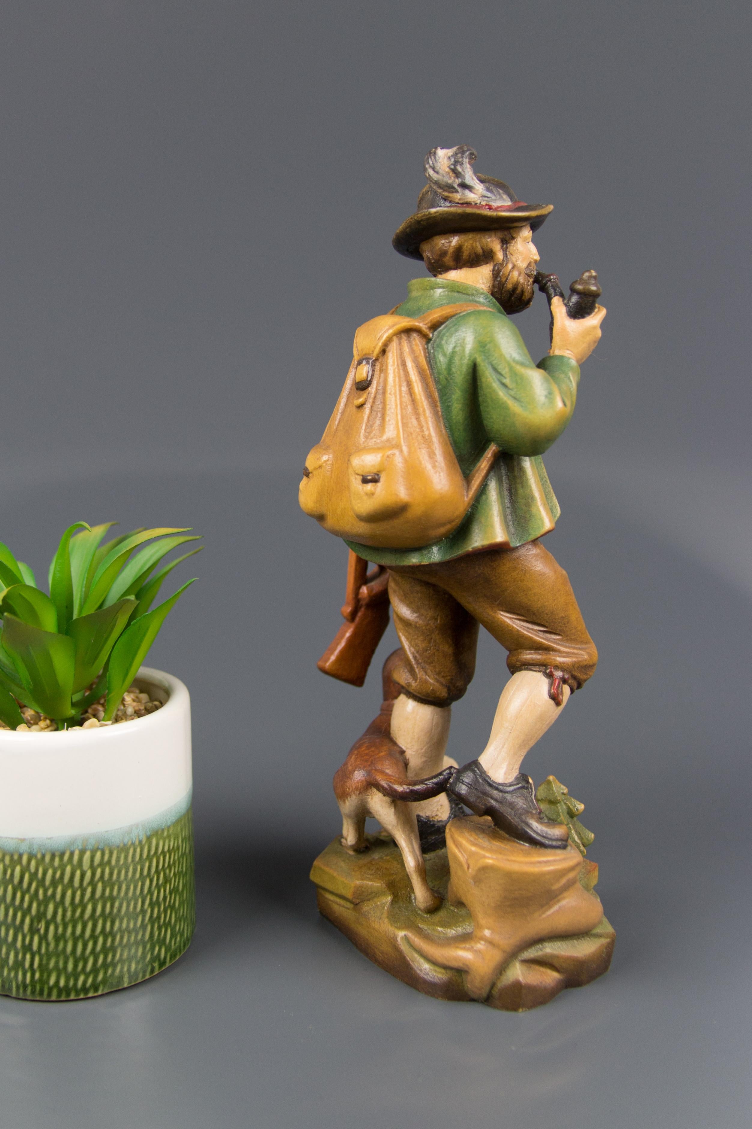Hand Carved and Hand Painted Wooden Sculpture of a Hunter with Dog In Good Condition For Sale In Barntrup, DE