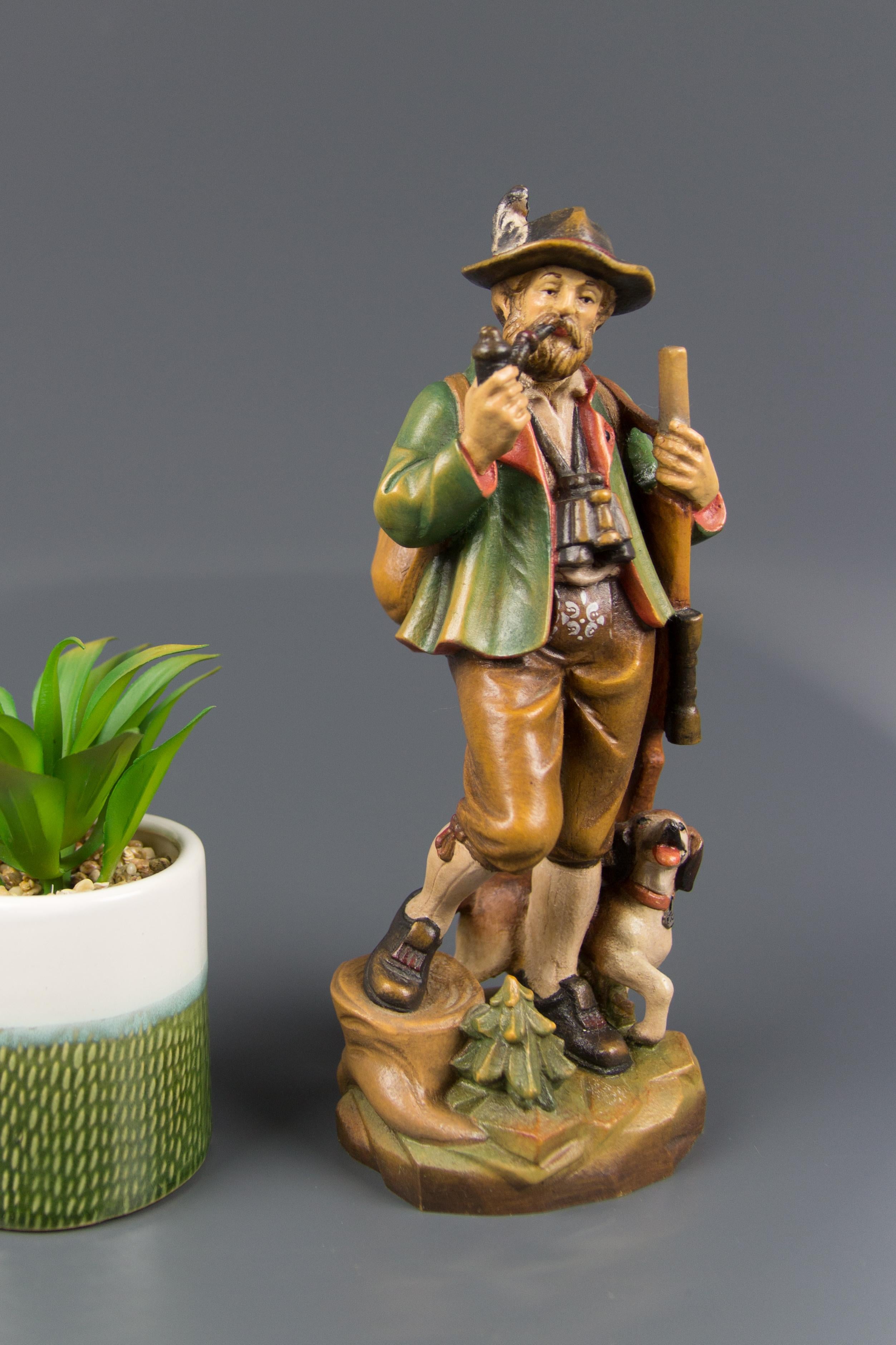 Hand Carved and Hand Painted Wooden Sculpture of a Hunter with Dog For Sale 1