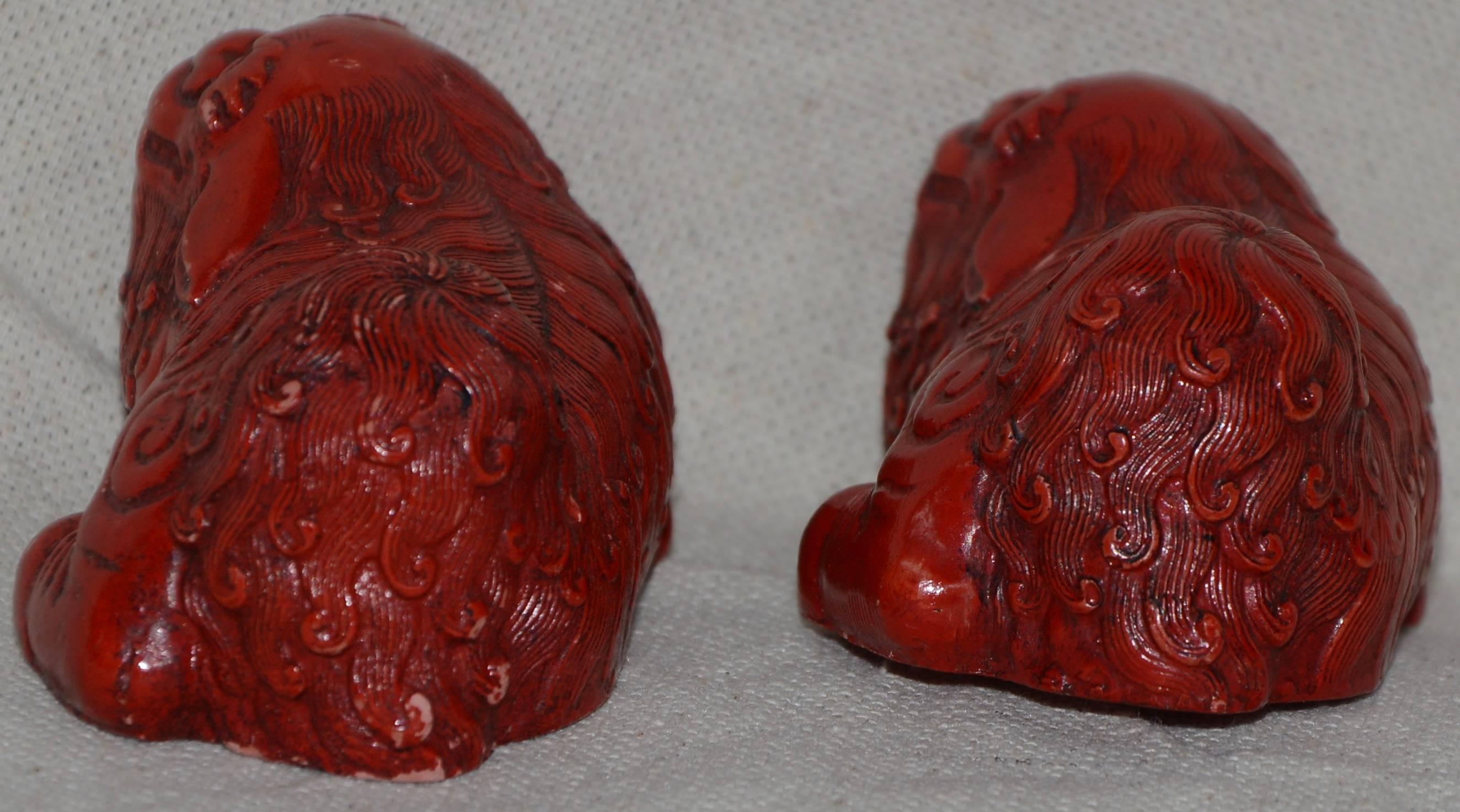 Hand-Carved and Lacquered Pair of Cinnabar Asian Foo Dogs In Good Condition In Cookeville, TN