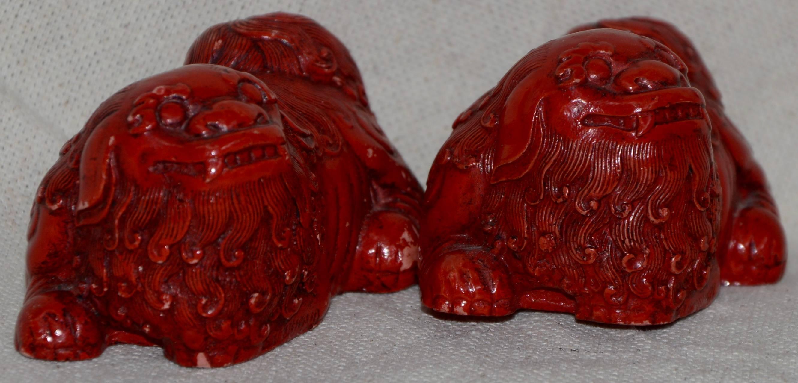 20th Century Hand-Carved and Lacquered Pair of Cinnabar Asian Foo Dogs