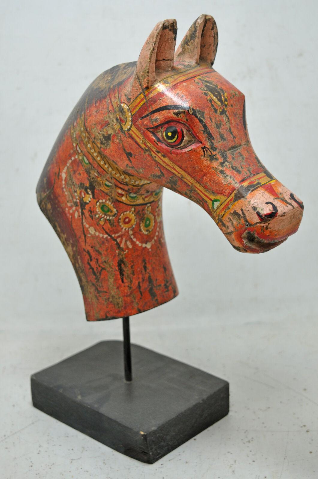 Hand-Carved and Painted Antique South Asian Folk Art Wooden Sculptural Horse Bust Decoration

Anonymous
Southern Asia; first-half of the 20th century
Polychromed wood

Approximate size: 3.6 x 8.8 x 13.6 in.

A distinctive display piece for a Rustic