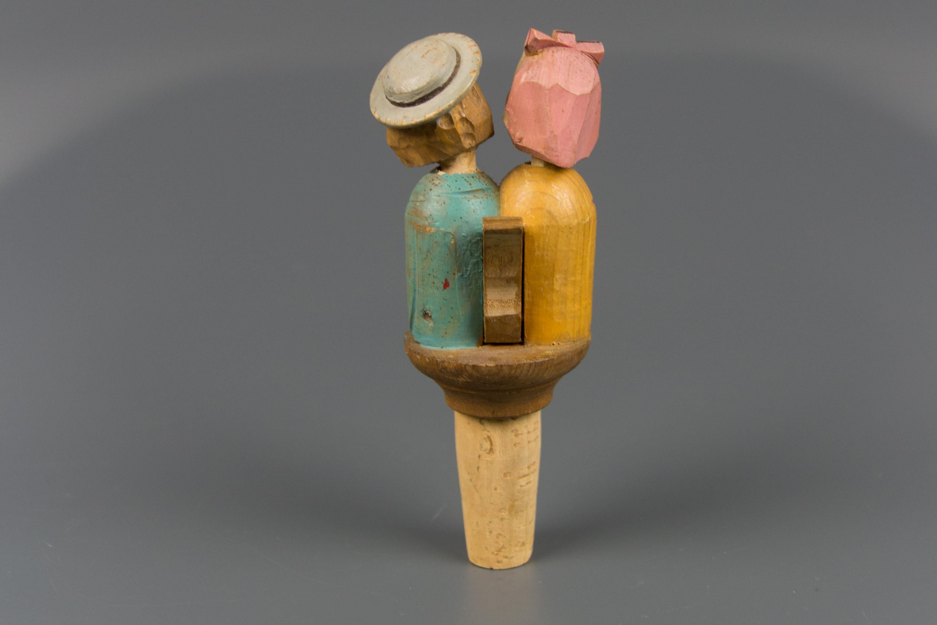 Hand Carved and Painted Mechanical Wooden Bottle Stopper Kissing Couple, 1950s 1
