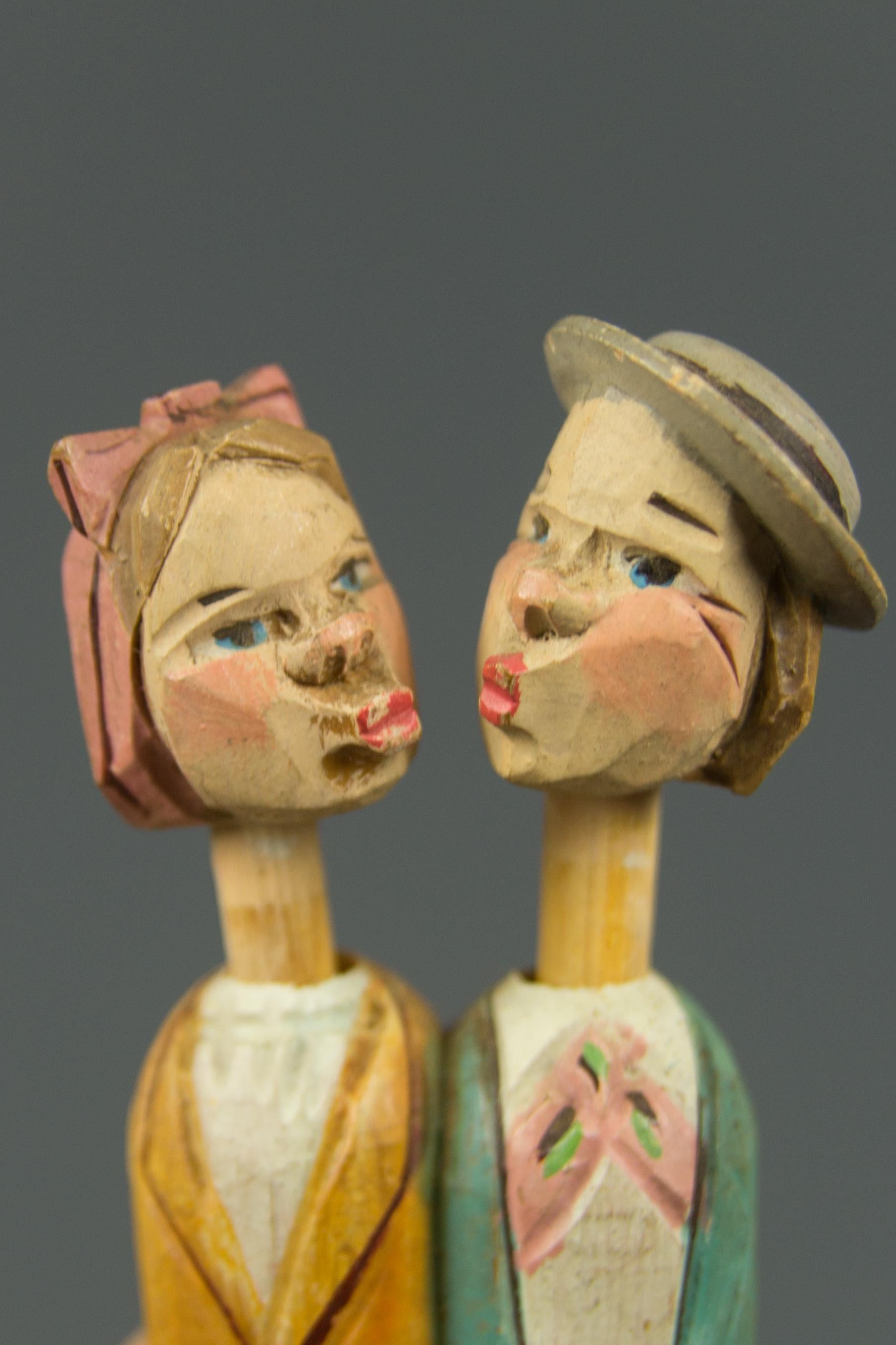Black Forest Hand Carved and Painted Mechanical Wooden Bottle Stopper Kissing Couple, 1950s