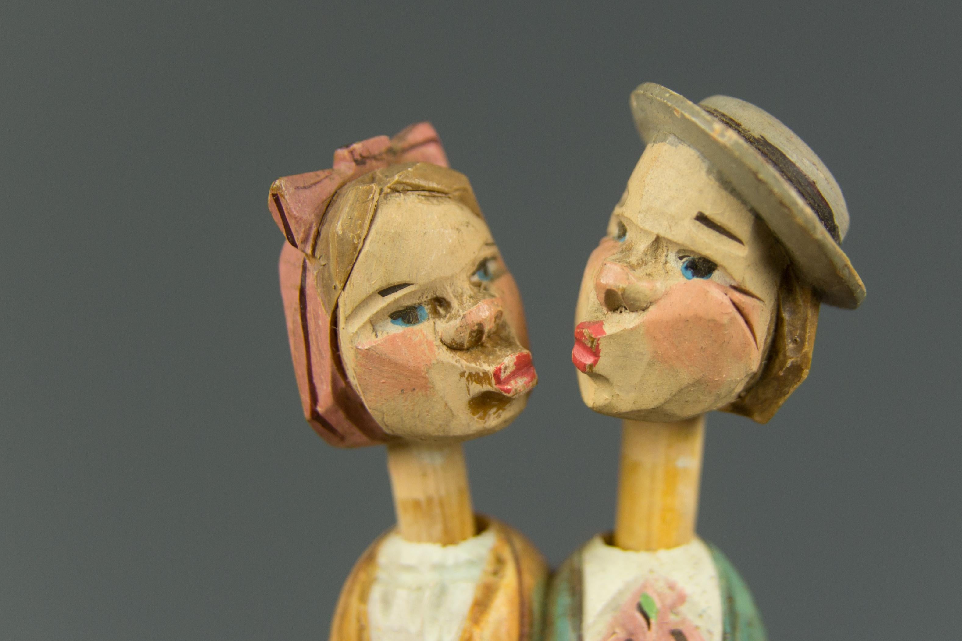 German Hand Carved and Painted Mechanical Wooden Bottle Stopper Kissing Couple, 1950s