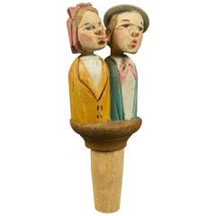 Retro Hand Carved and Painted Mechanical Wooden Bottle Stopper Kissing Couple, 1950s