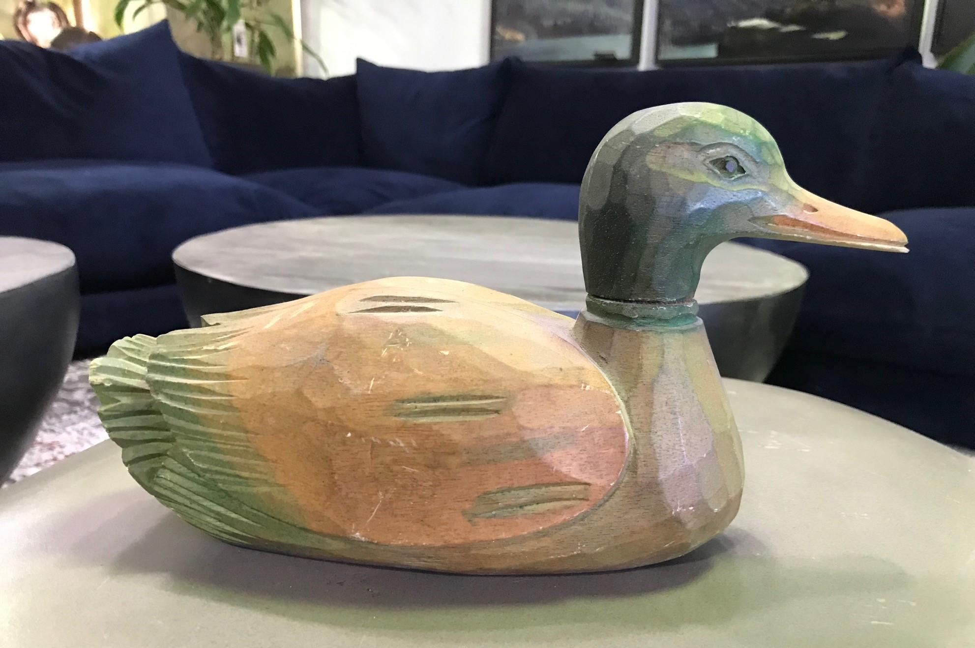 A nicely carved mid-20th century handmade green-headed duck decoy with swivel neck.

From an extensive collection of vintage /antique duck decoys including a pair by D. W. Nichol (which we have also listed).

Would be a great addition to any