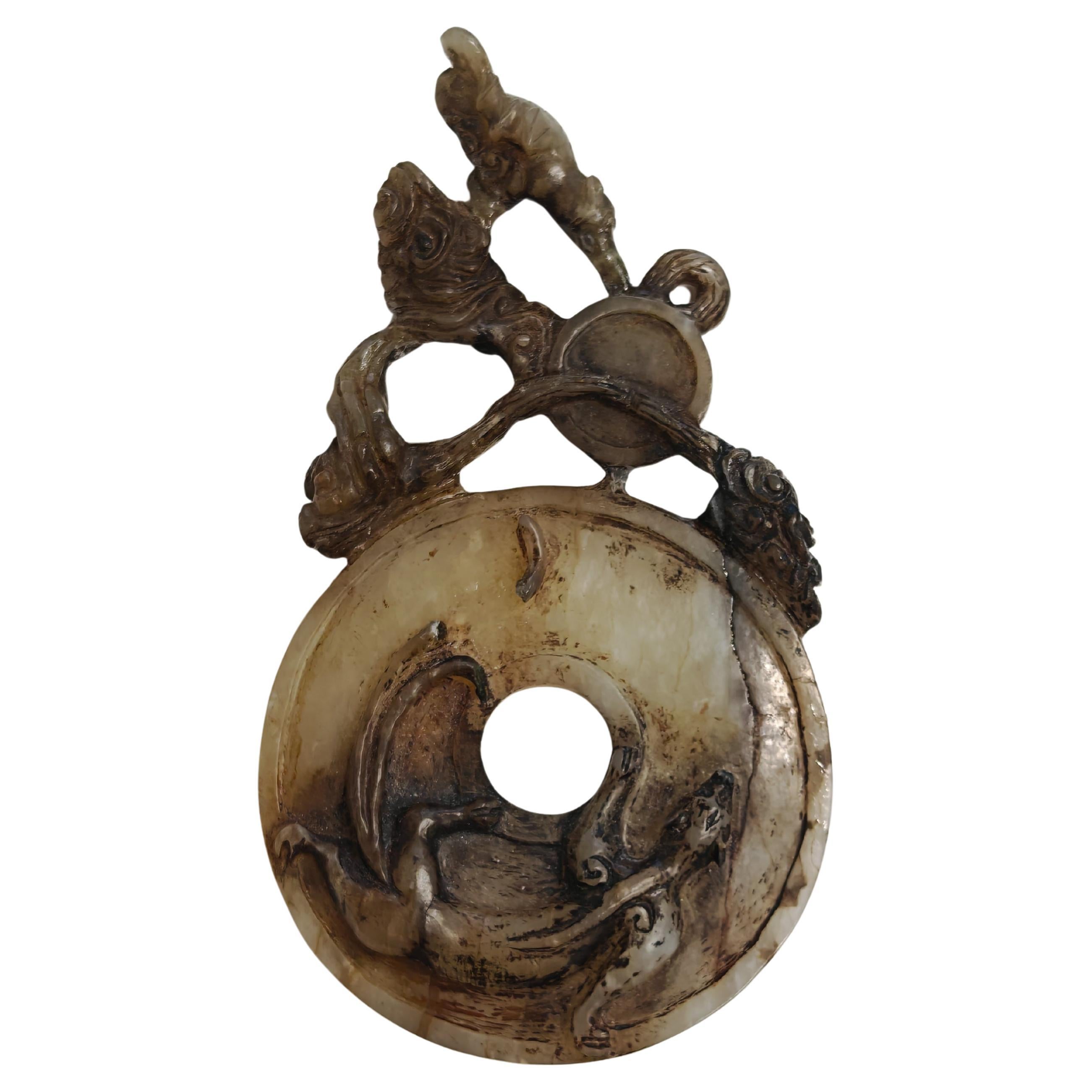 Hand-carved Antique bi pendant in jade. China 19th Century For Sale