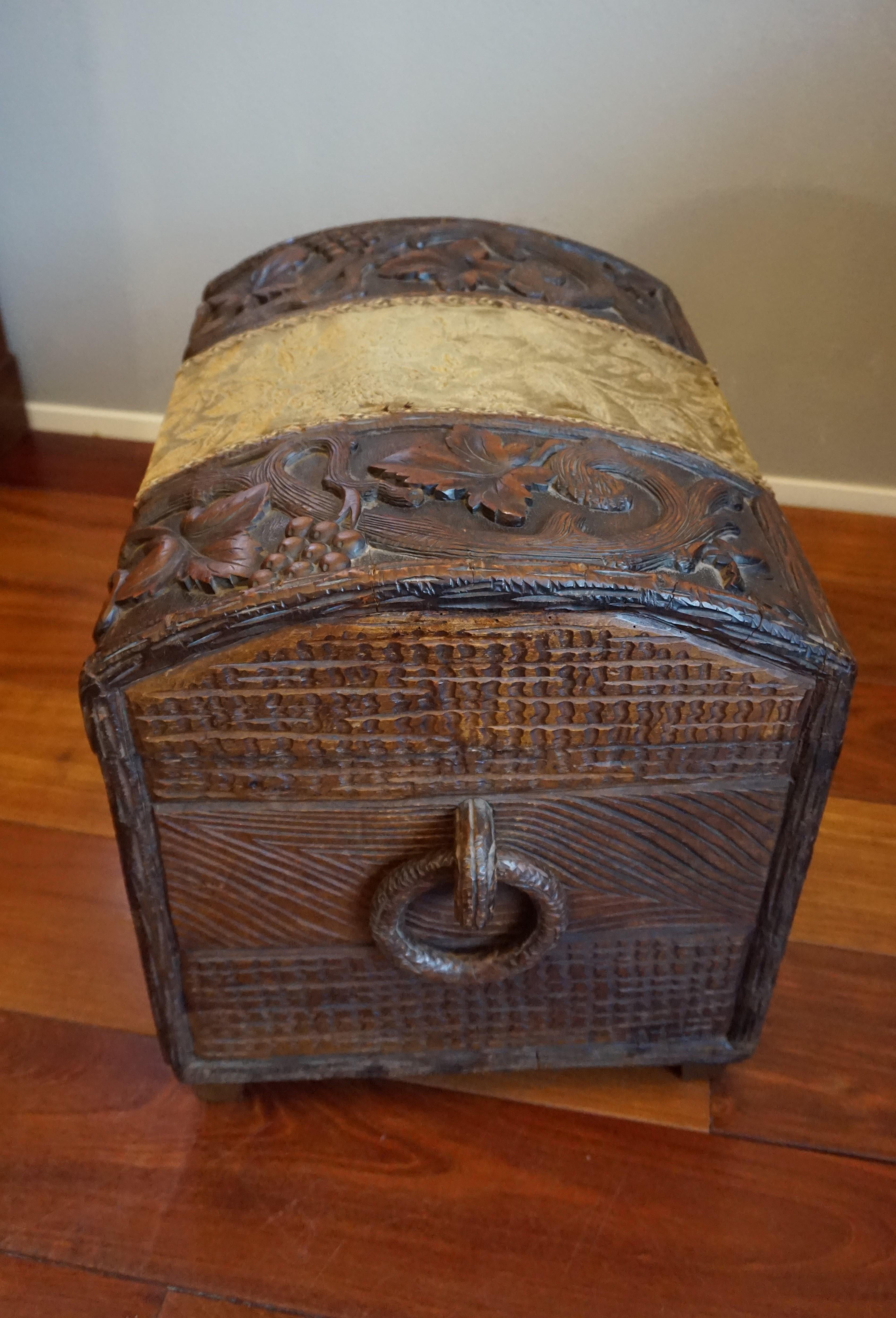 Stunning late 19th century trunk with wine theme carvings.

If you are looking for rare, stylish and good quality antiques to decorate your home or lodge, but you do want them to have a purpose as well, then this all handcrafted trunk from the late