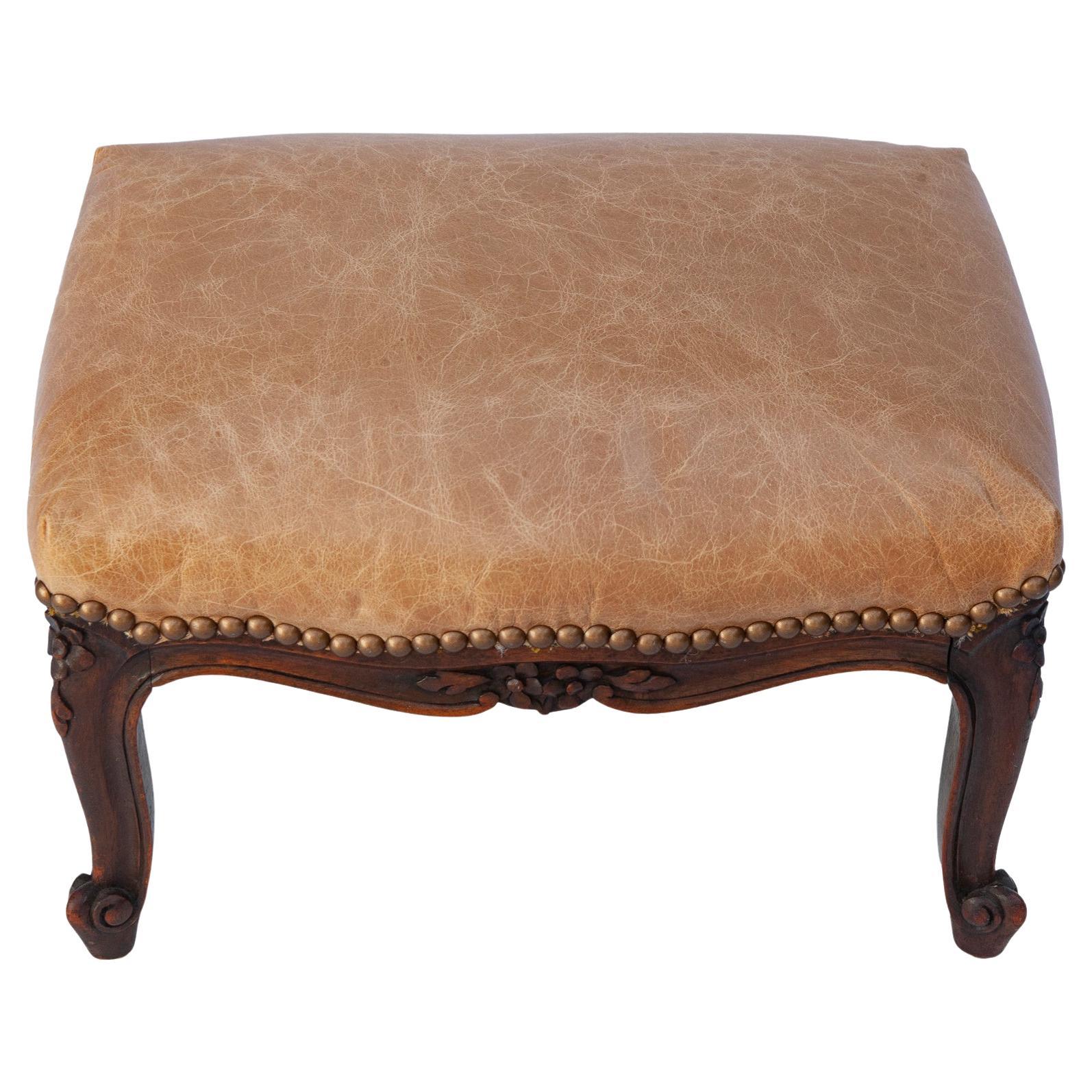 Tabouret en cuir français ancien sculpté à la main