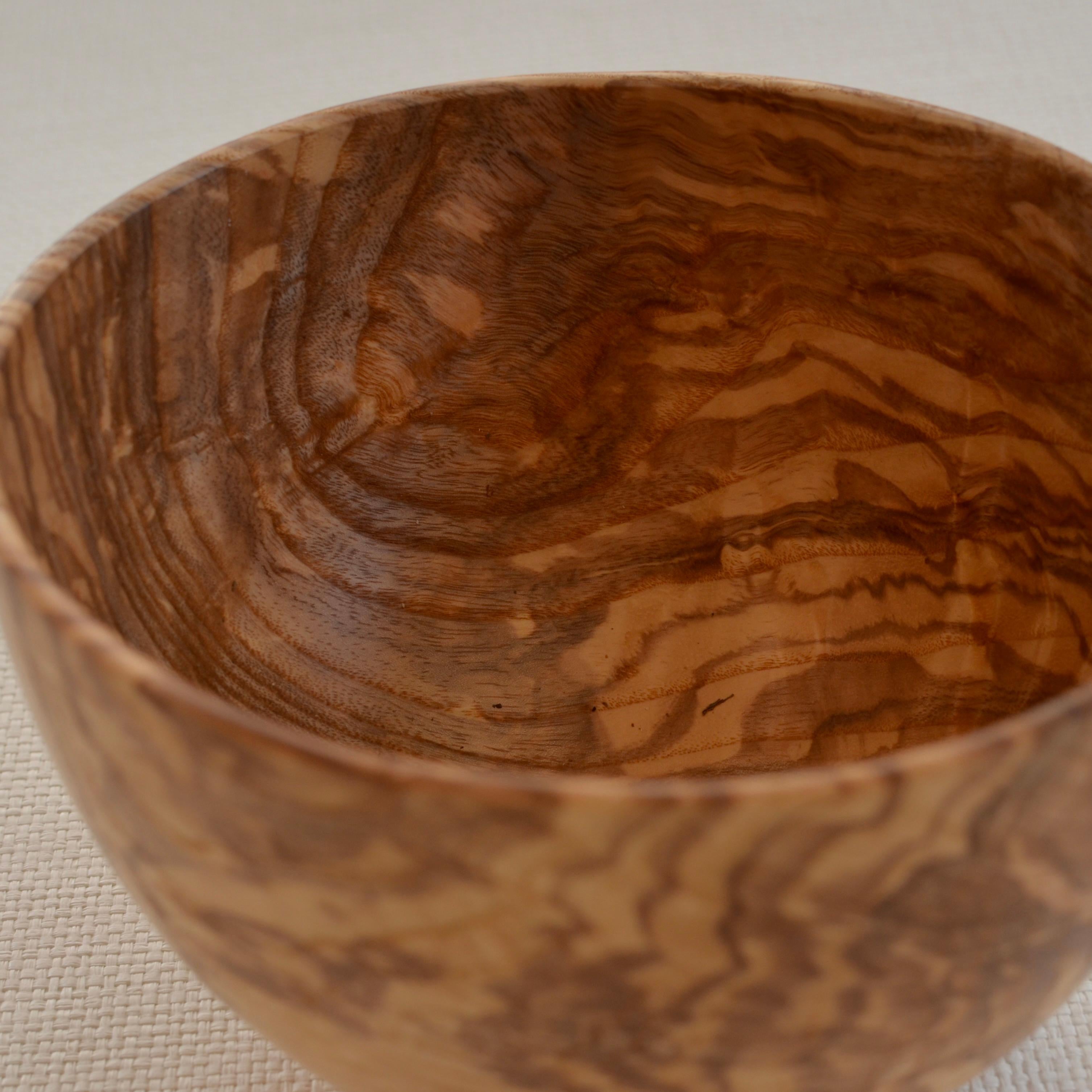Hand-carved, oiled, 100-year-old Ash wood bowl with natural grain. Created using wood only from fallen Ash trees. One of a kind.