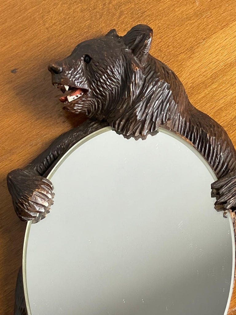 Swiss Hand Carved Black Forest Bear Sculpture Hand or Vanity Mirror with Beveled Edge For Sale