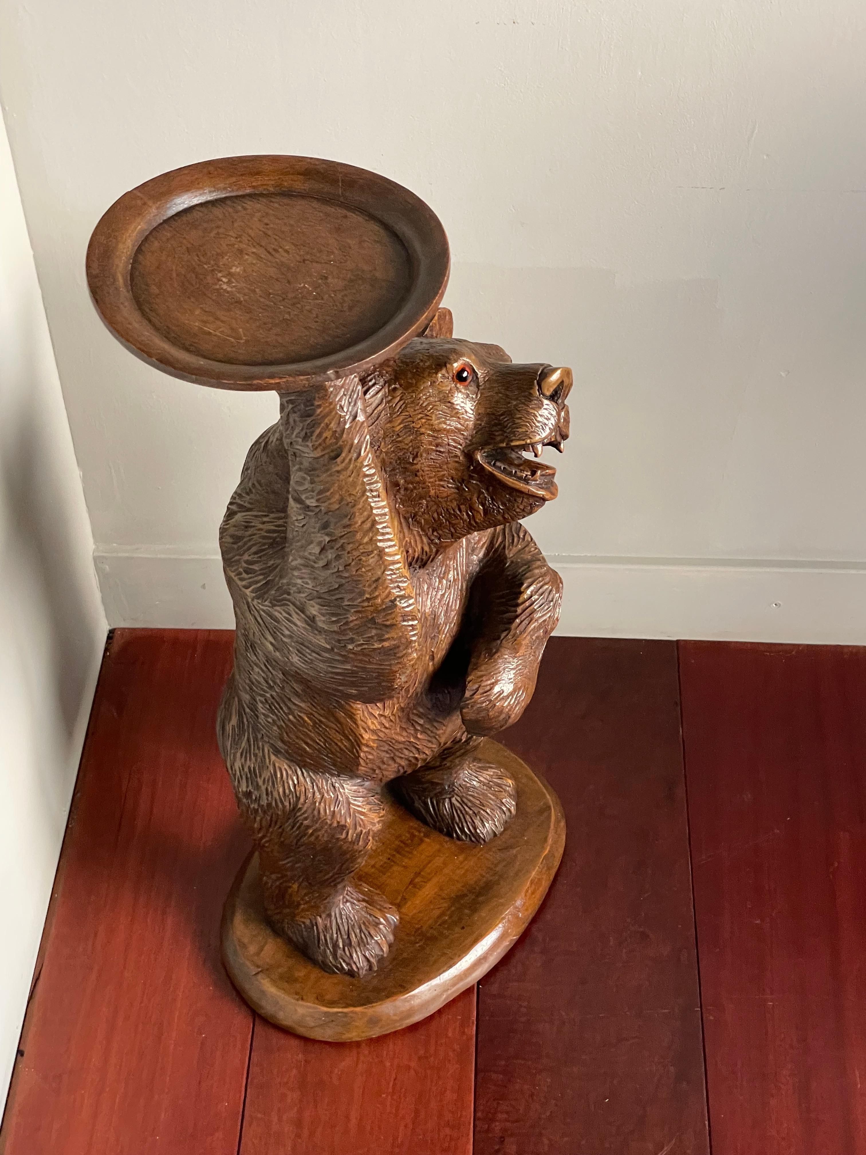 Hand carved Black Forest bear 'waiter' or bottle display stand.

This original and all-hand carved Black Forest sculpture from the South of Germany is another one of our recent great finds. This not only is a very rare size Black Forest bear