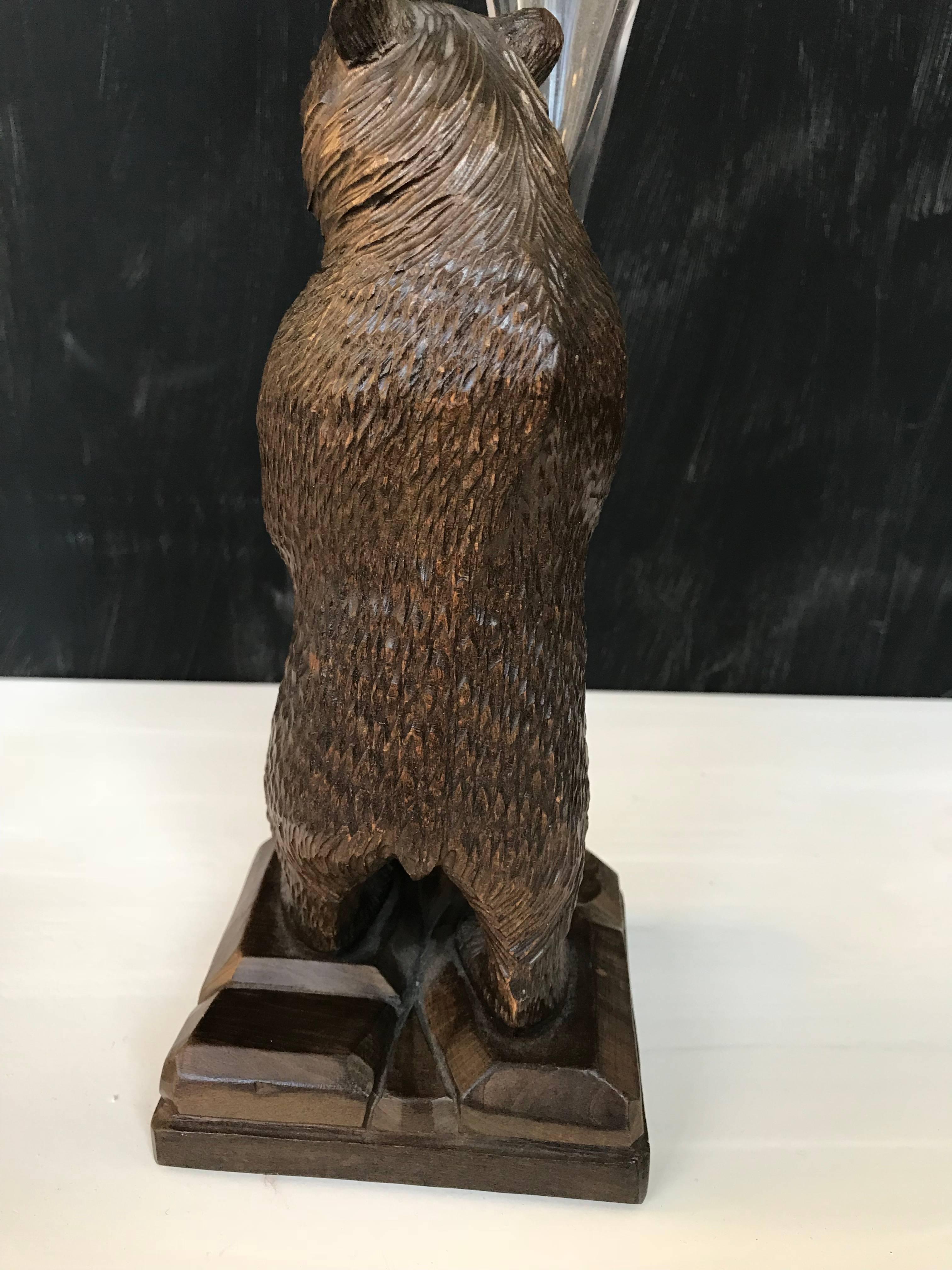 20th Century Black Forest Carved Wooden Standing Bear with an Engraved Glass Vase or Flute For Sale