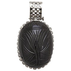 Hand Carved Black Obsidian Pendant with White Sapphires