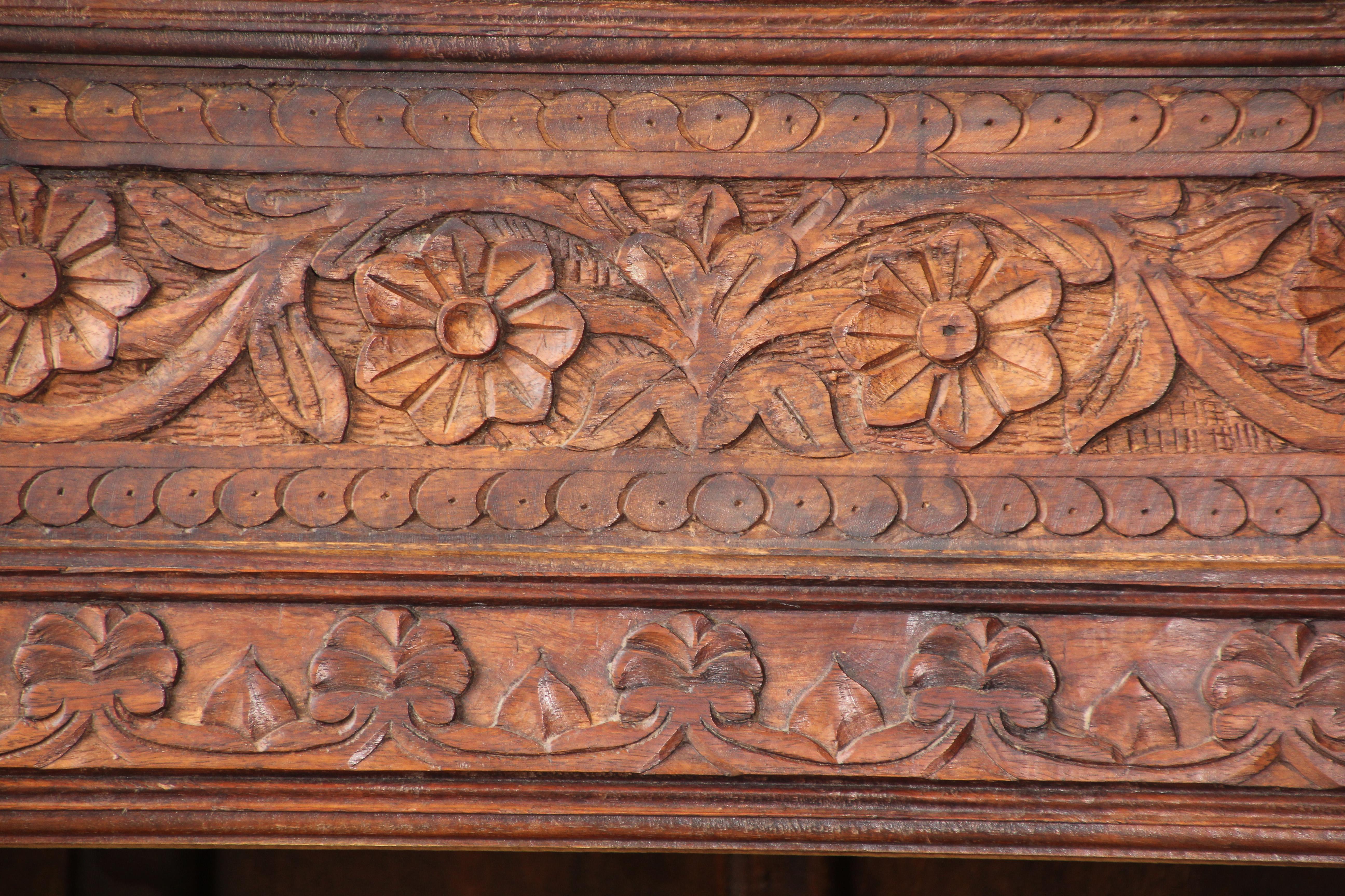 carved wood bookshelf