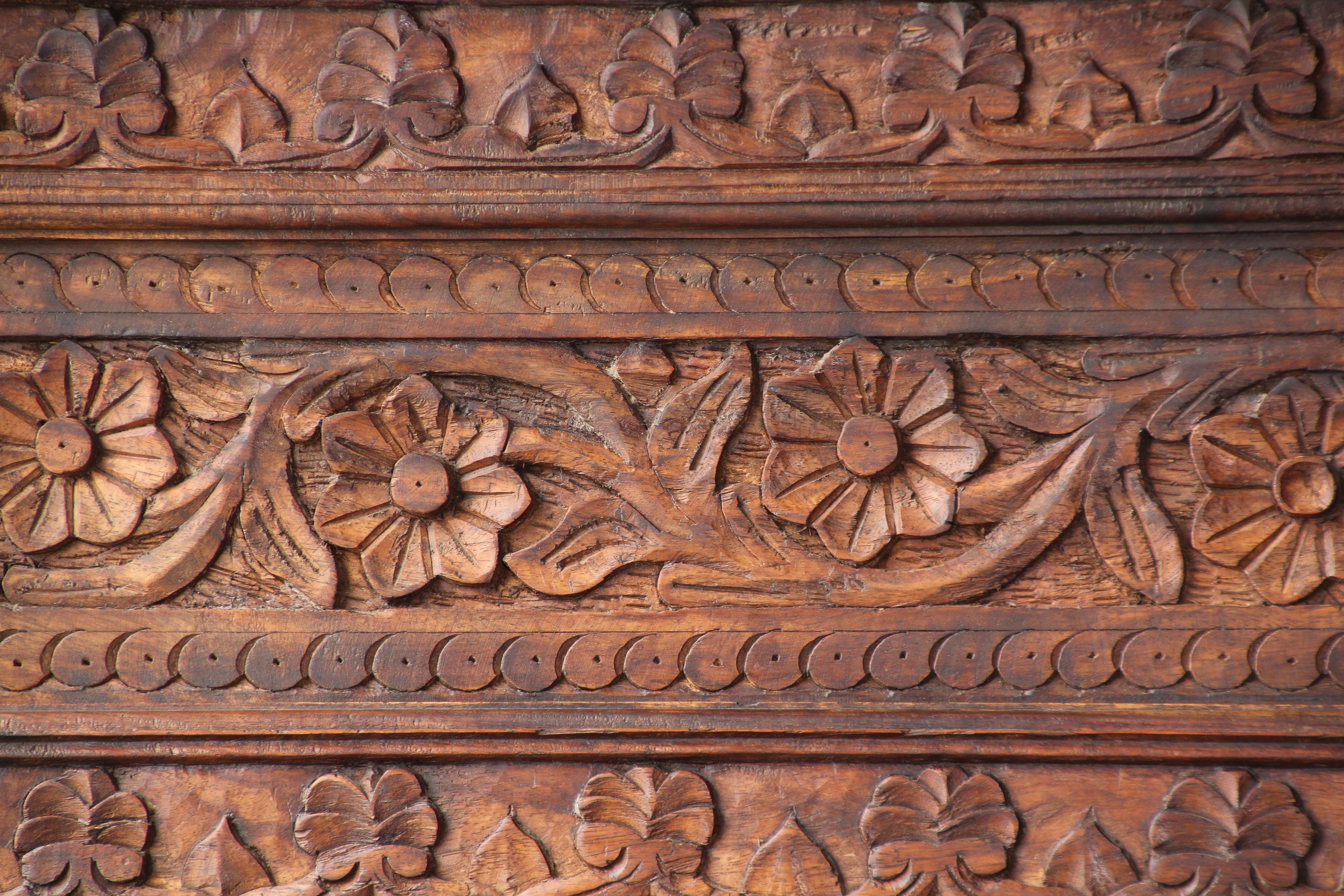 carved wood bookcase