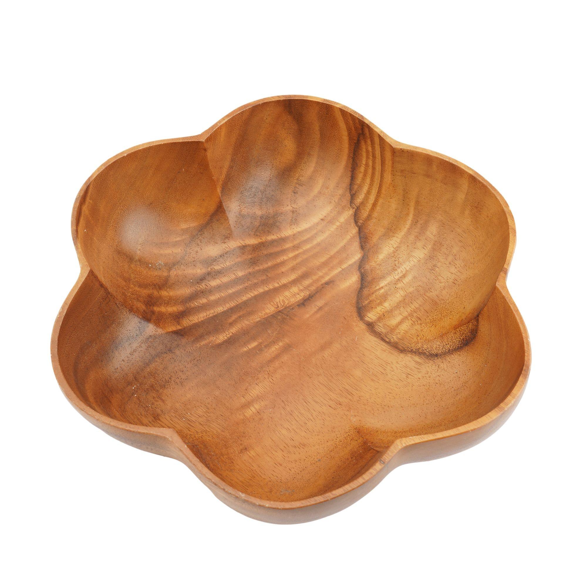 Turned and hand carved five lobe bowl from a single piece of figured monkey pod wood.

Hawaii, circa 1950.
