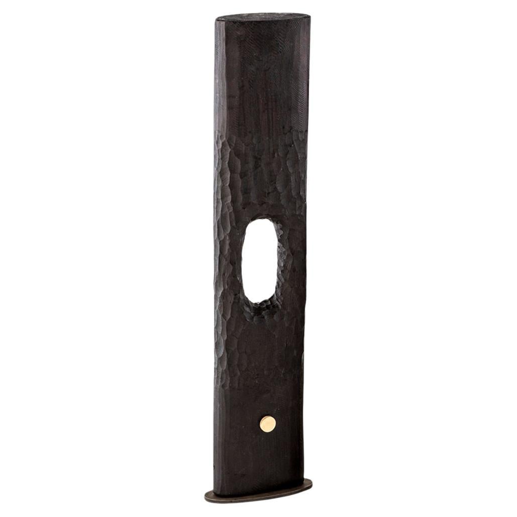 All our totem sculptures are hand-carved in Southern Africa from sustainable African alien timber by a group of Zimbabwean artists who set their own prices, thus making them fair trade. 

These sculptures have a strong African, primal and Brutalist