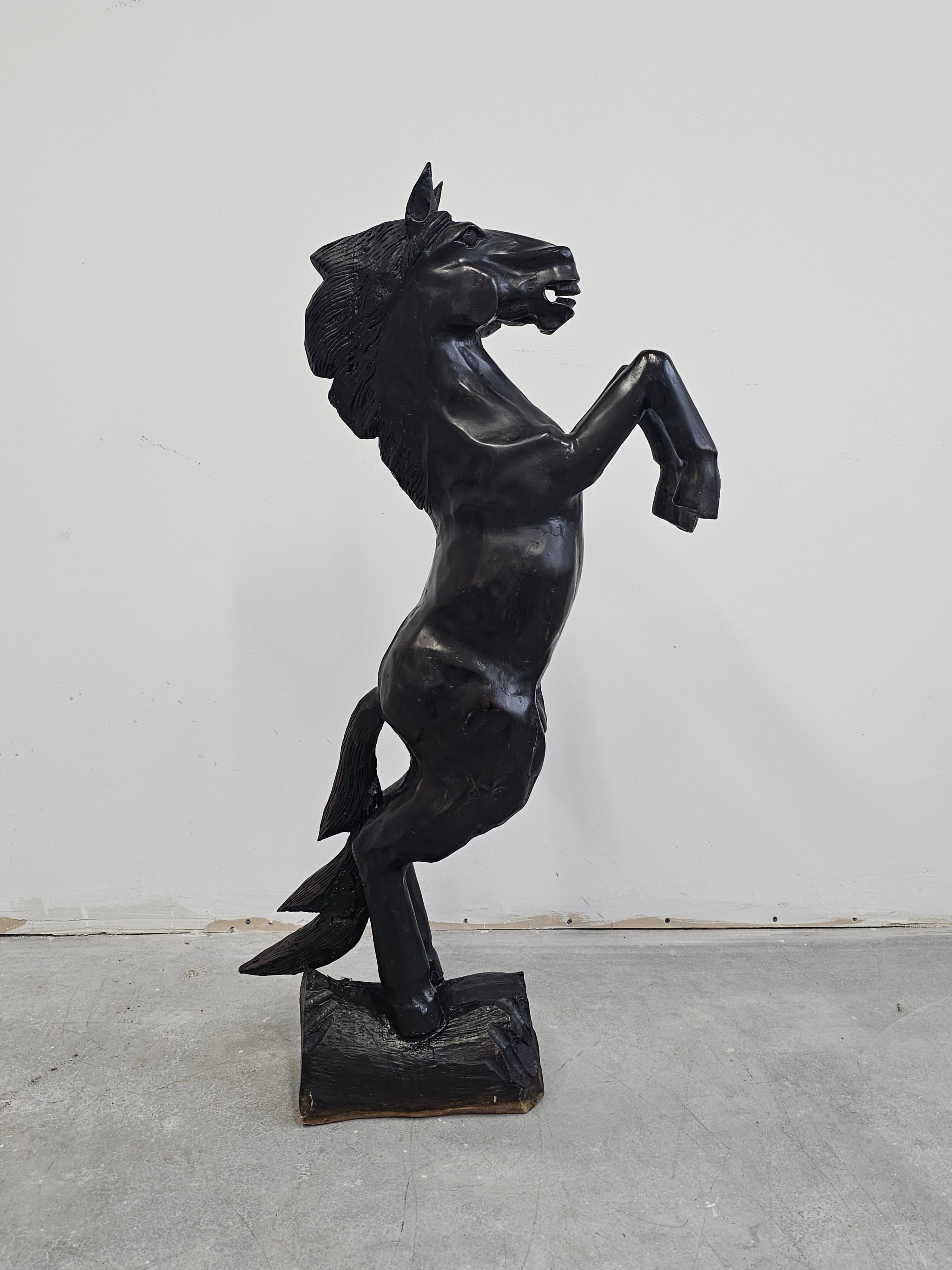 In this listing you will find a hand-carved Brutalist Horse Sculpture done in wood. Body of the horse is carved out of a single piece of wood, while its legs have been added afterwards. It features strong, musculature lines typical for brutalist