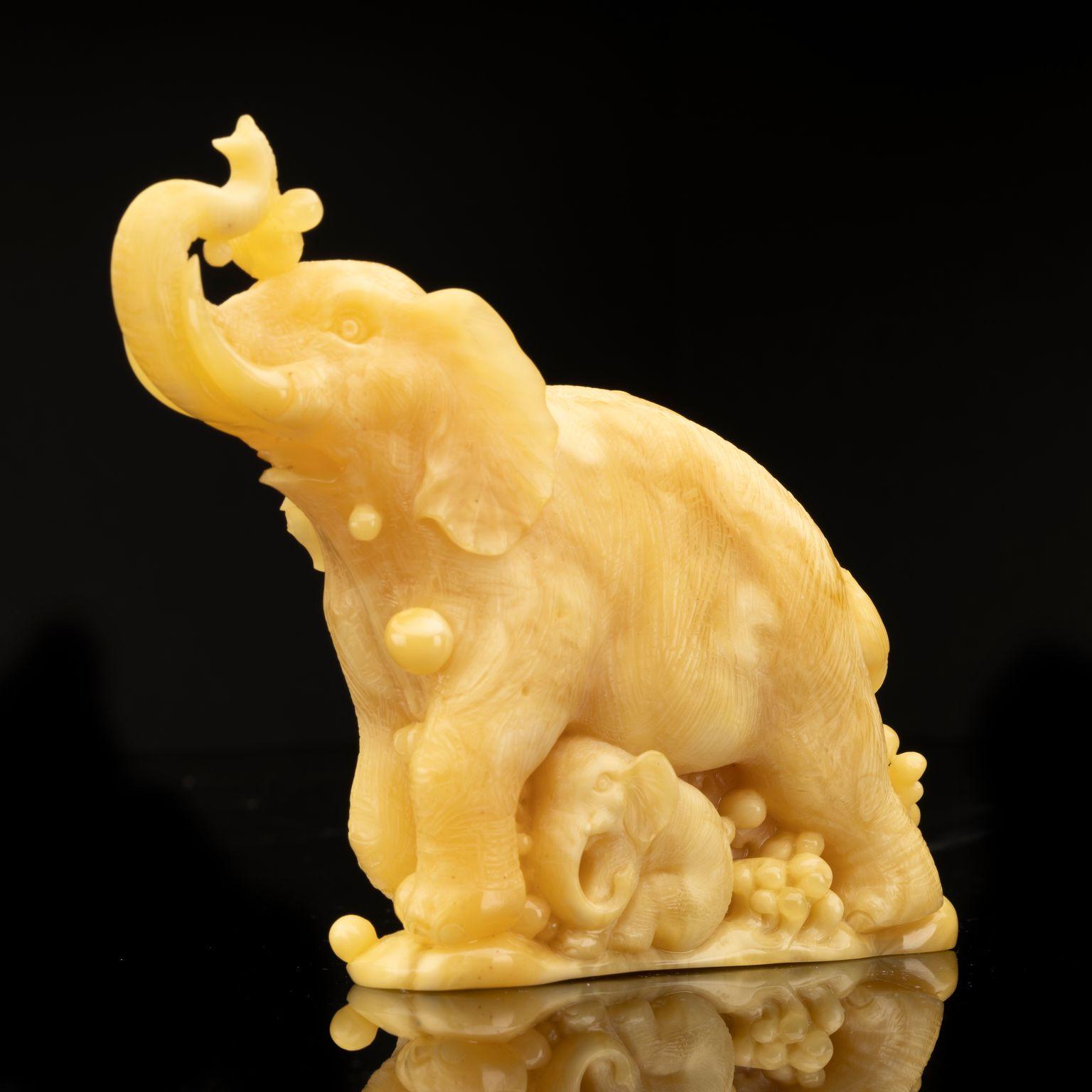 Hand-Carved Butterscotch Amber Elephant In New Condition In New York, NY