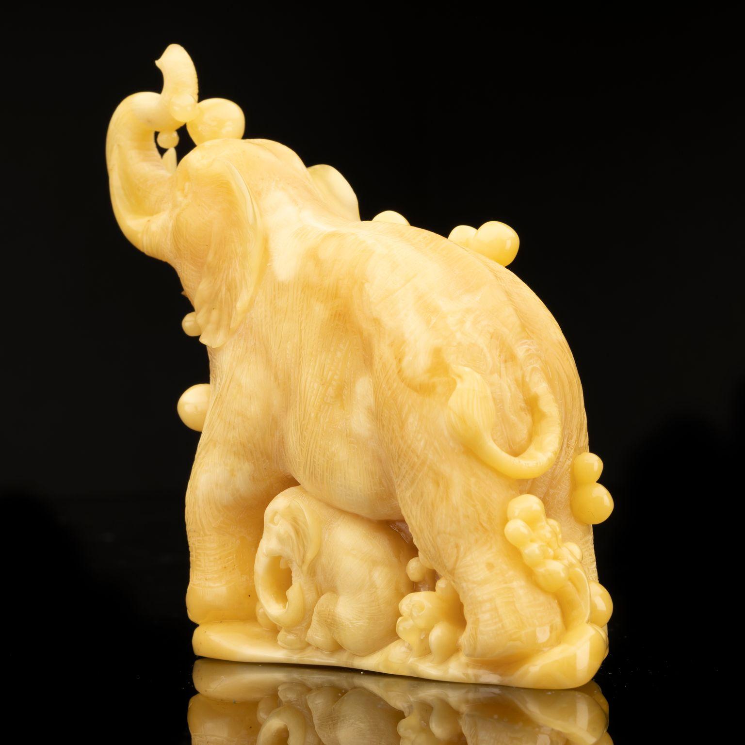 Contemporary Hand-Carved Butterscotch Amber Elephant
