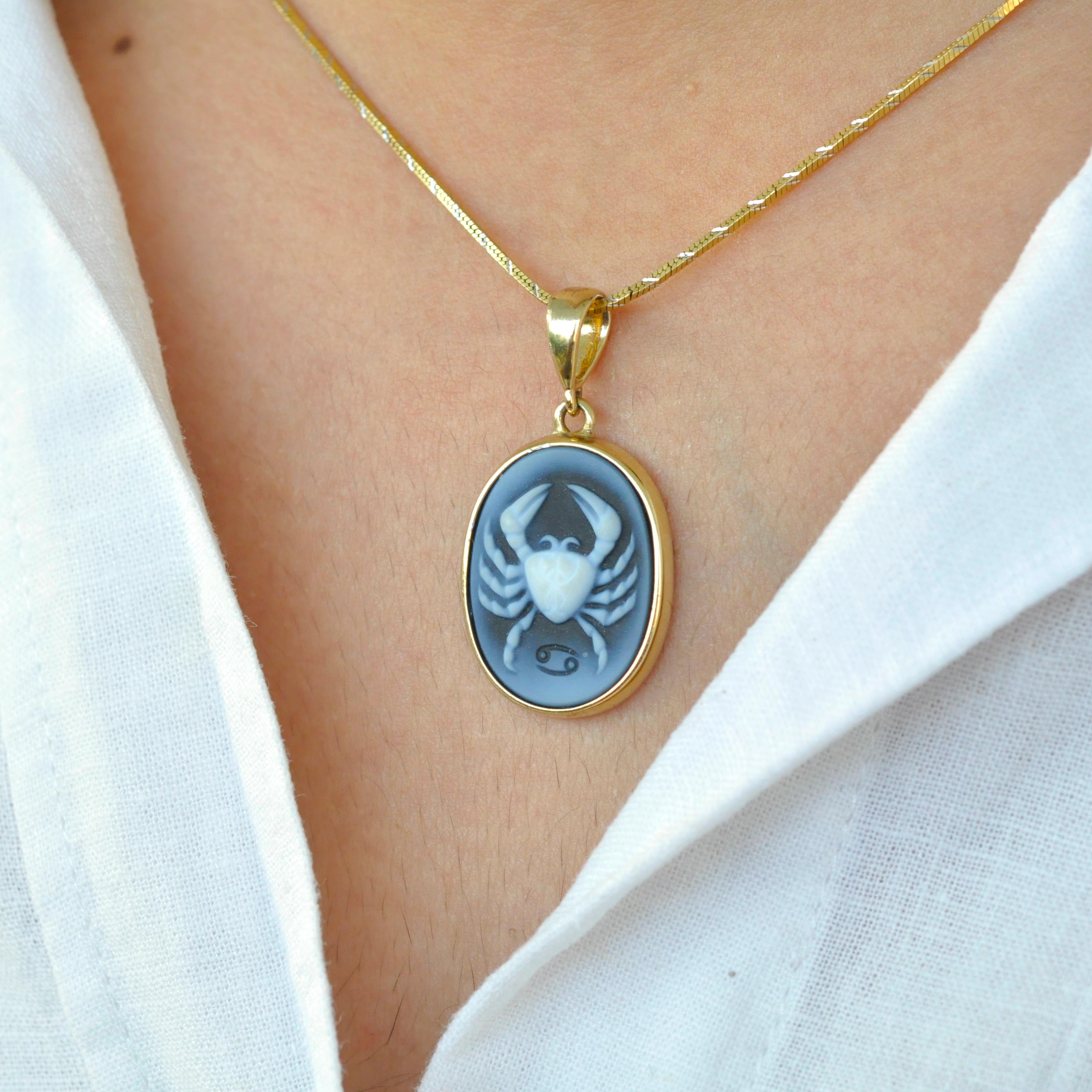 Here's our cancer zodiac carving cameo pendant necklace from the zodiac collection. The cameo is made in Germany by an expert cameo engraver on the relief of 100% natural agate rock from Brazil (a variety of chalcedony). The pendant is set in our