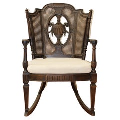 Hand Carved & Caned Back Rocking Chair