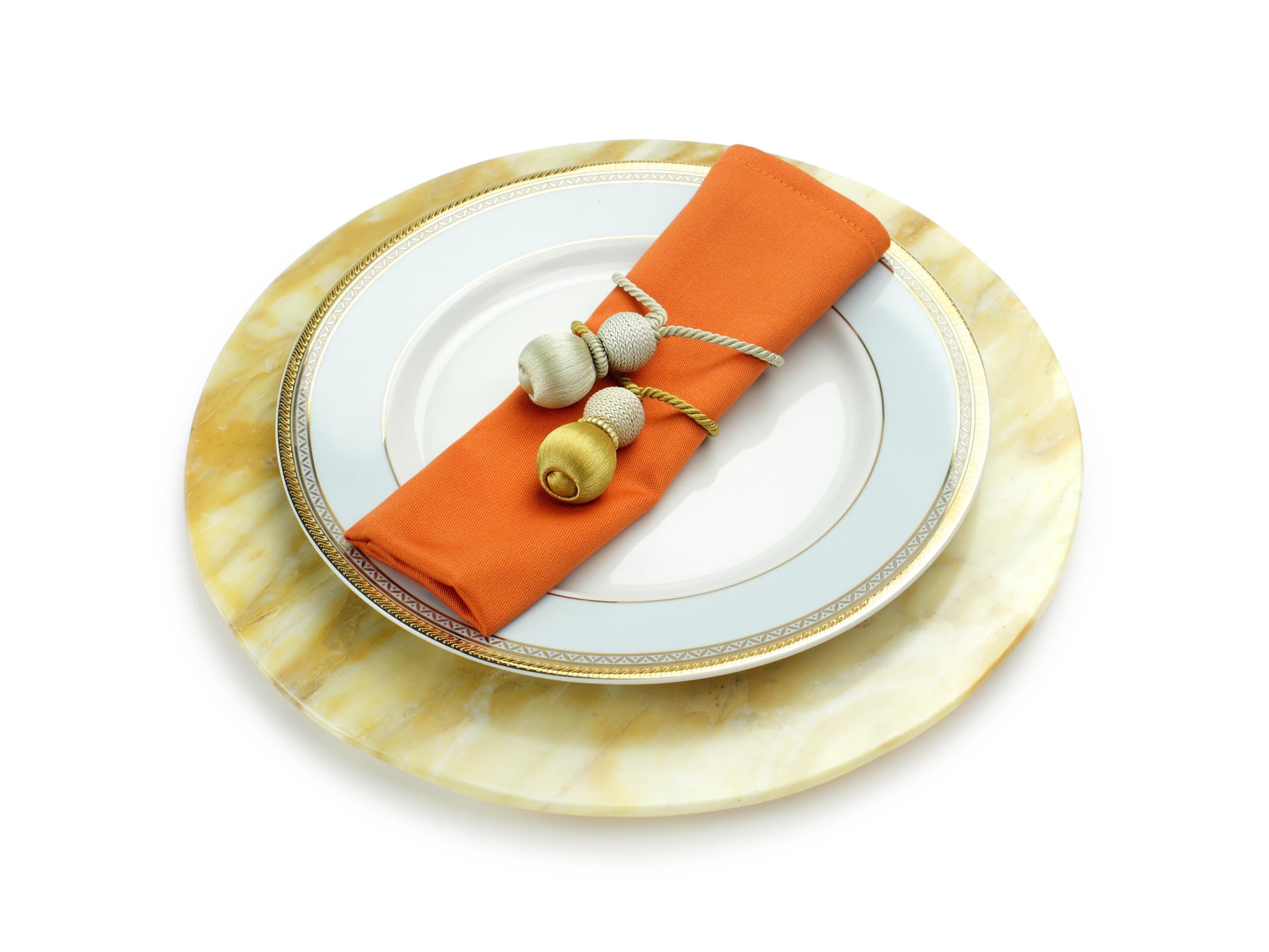 Hand carved charger plate from Yellow Siena marble. Multiple use as charger plates, plates, platters and placers. 

Dimensions: D 33, H 1.9 cm. Available in different marbles, onyx and quartzite. 

100% Hand made in Italy. 

Marble is a natural