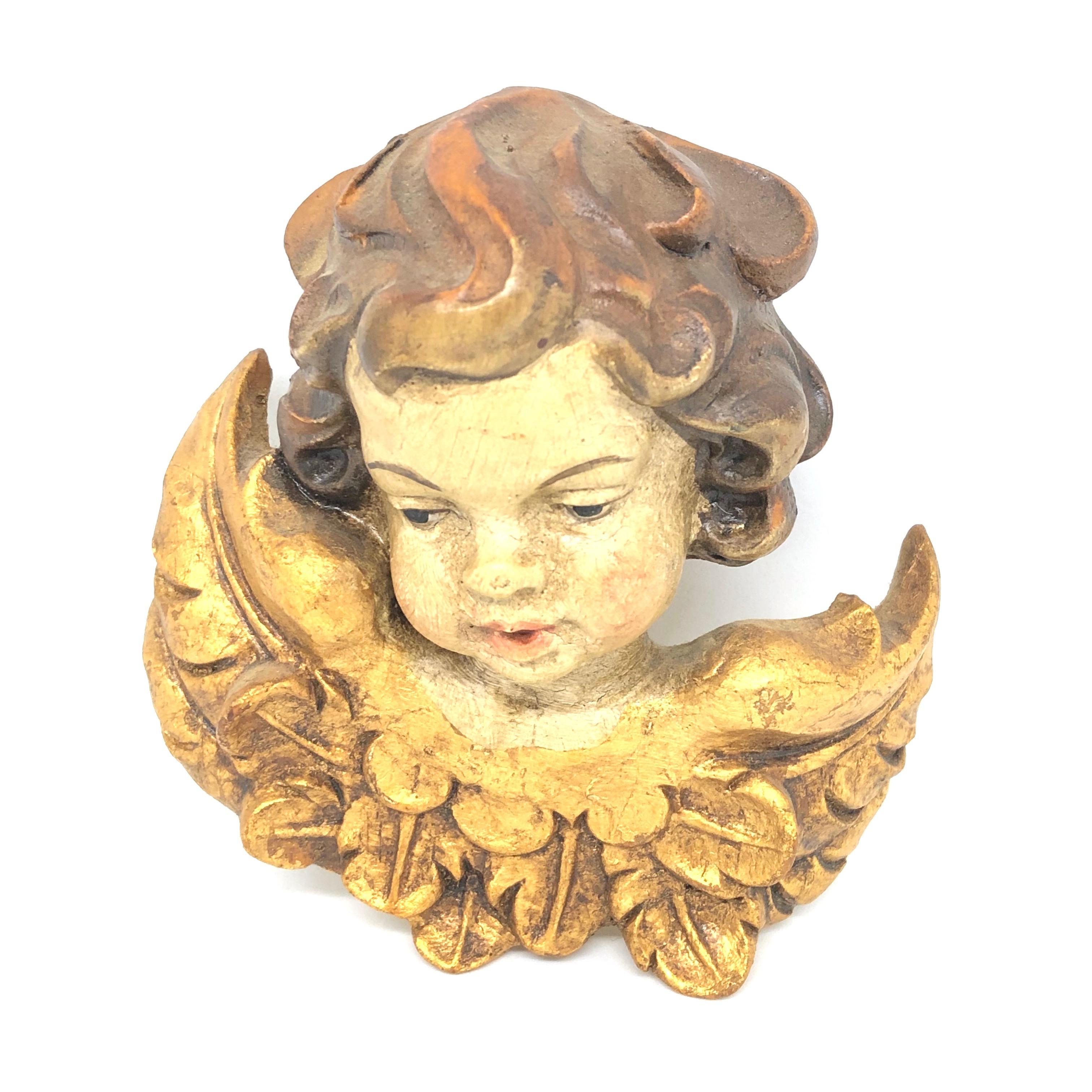 Beautiful hand carved cherub angel Head, found at an estate sale in Germany. Made by a woodcarver in the Oberammergau area in Germany, this area is well-known for their wood carvings. We believe that this piece is from the 1950s or older. A nice