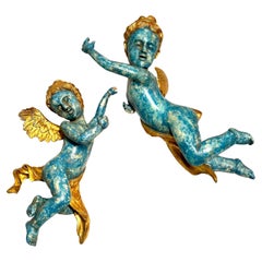 Hand-carved Cherub Sculptures and Polychrome and Gold Leaf. Italy, 19th century