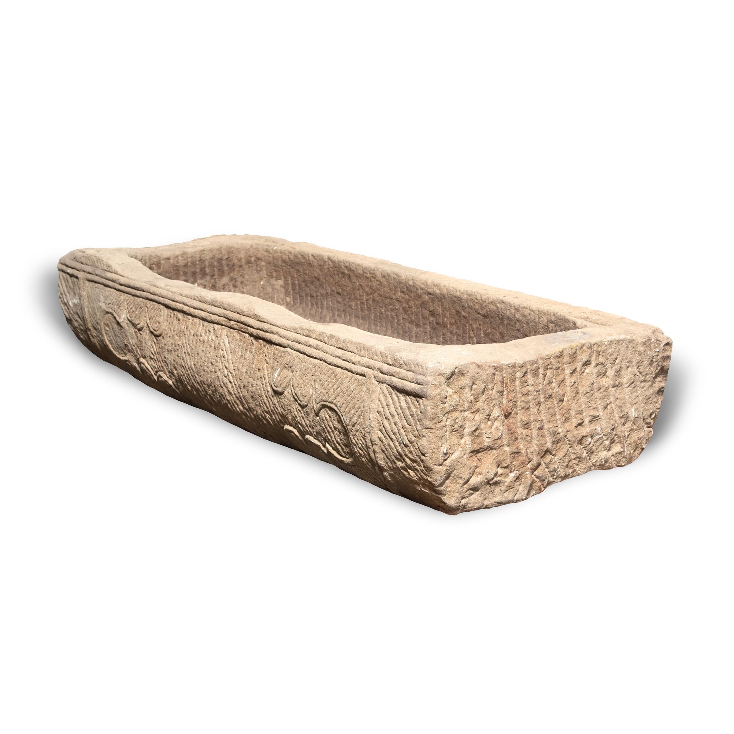 Prized mounts once took refreshment from this stone trough, carved from a solid block of limestone more than one hundred years ago. Once purely functional, the trough is celebrated today for its elegant form, rustic authenticity, and beautifully