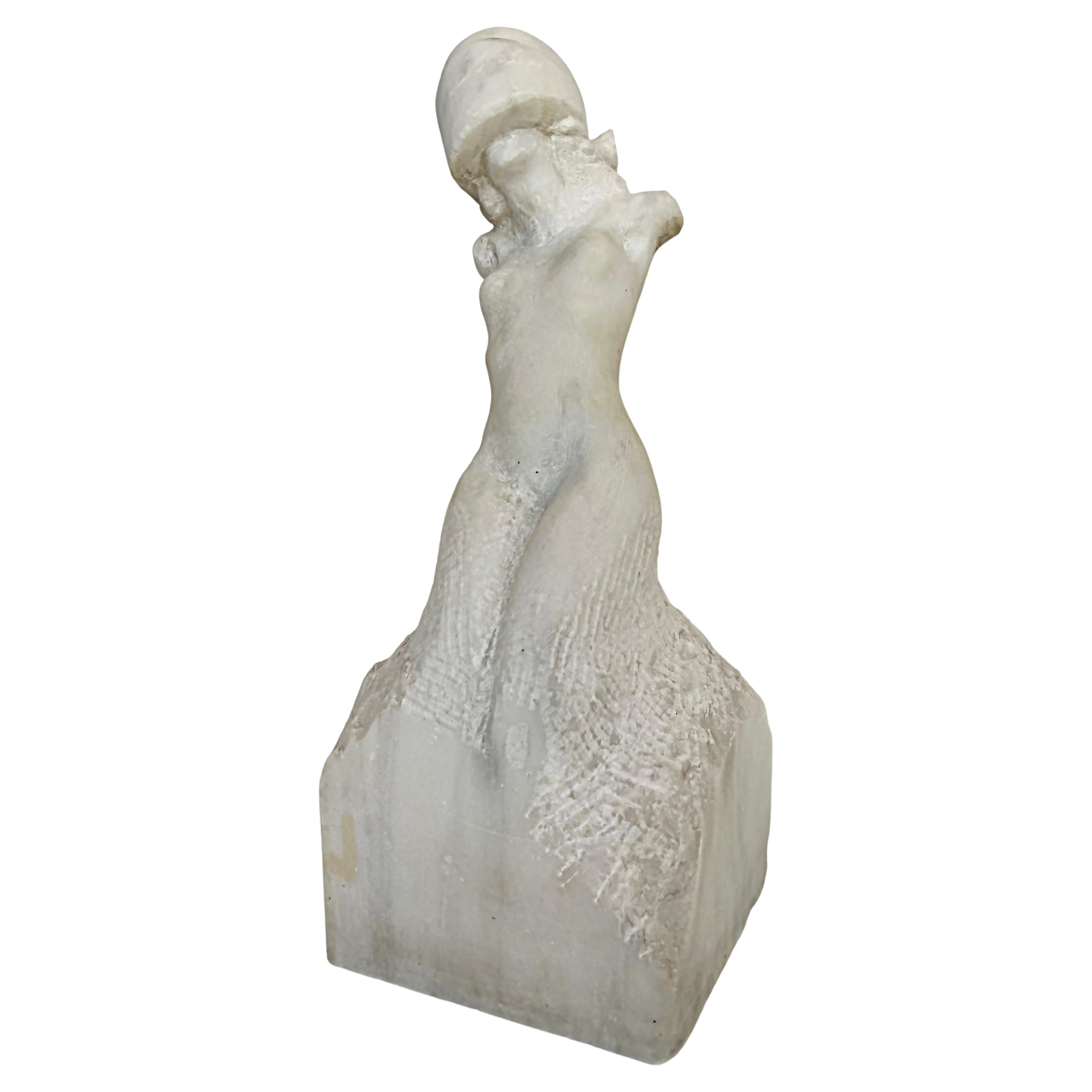 Offered for sale is a vintage 20th-century hand-carved marble sculpture of a classical nude female with an Art Deco helmet. The sculpture is created in the manner of Marc Quinn or Leo Caillard with their mixing of old and new styles The sculpture
