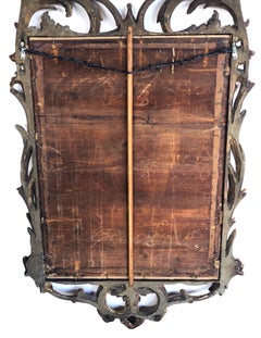 Specchio in legno dorato intagliato a mano di epoca rococò continentale