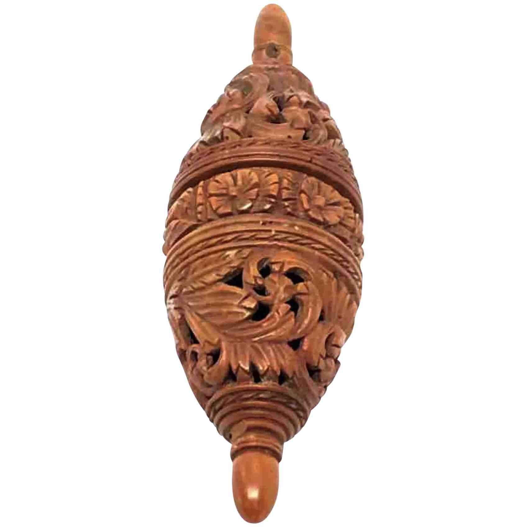 A beautiful hand carved coquille nut egg box. Beautiful carving, great patina, unscrews at center to open.
The original use was a flea trap, things were different in the old days and pesticides were not available.
So some stuff just flourished,